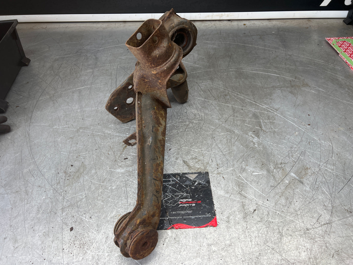 Porsche 924 944  -85.5 Rear left trailing arm, 94433102100