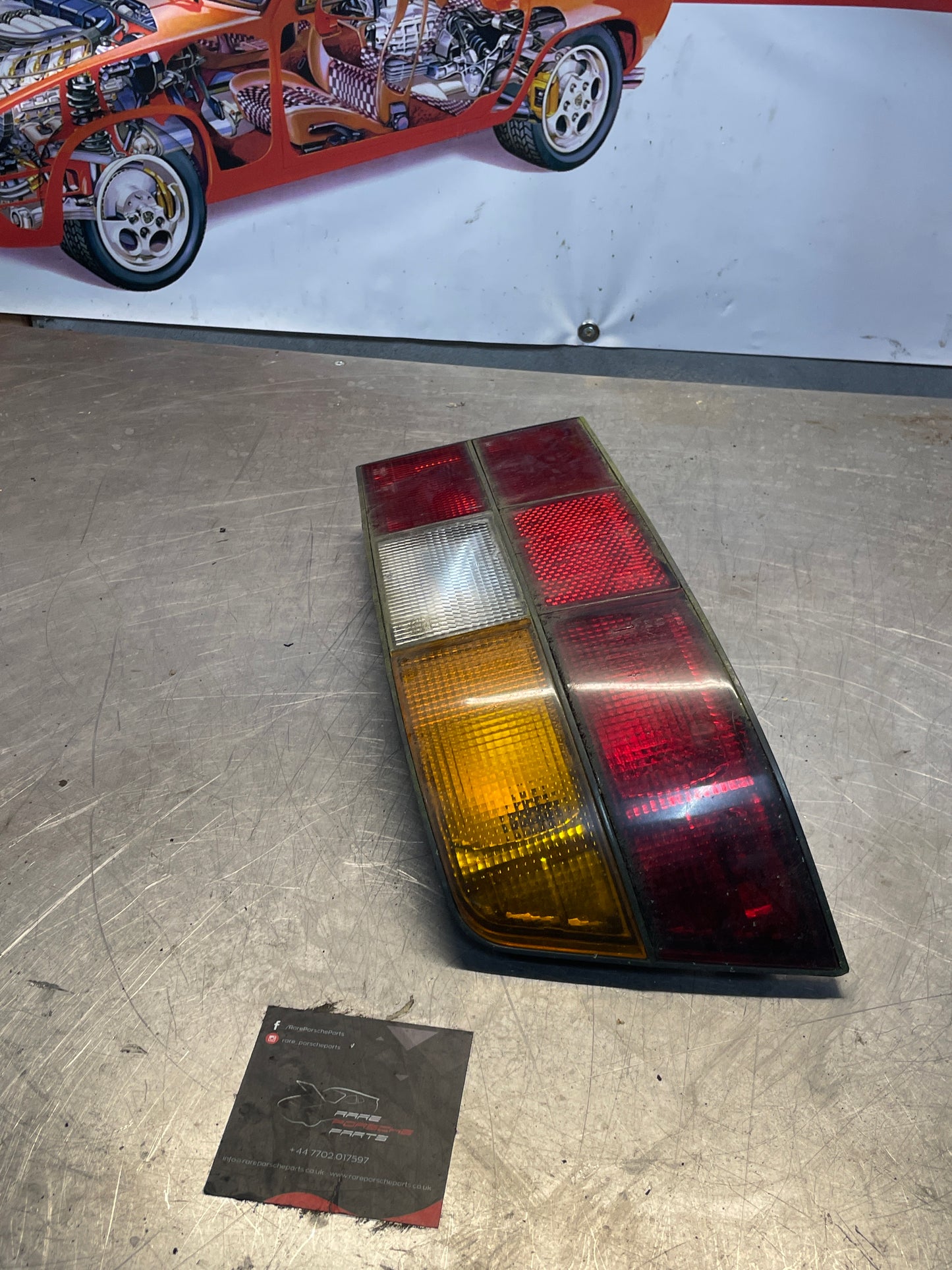 Porsche 924 / 944 left tail light, used