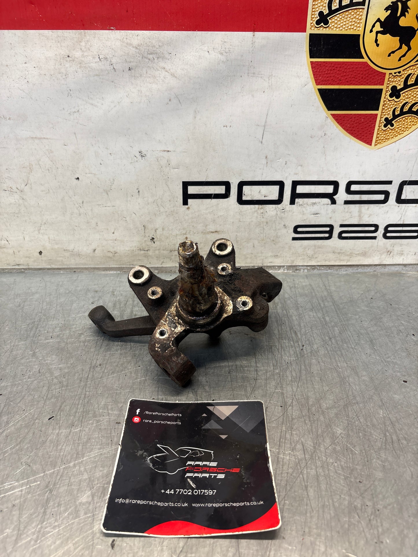 Porsche 928 right steering spindle knuckle, used 92834105803