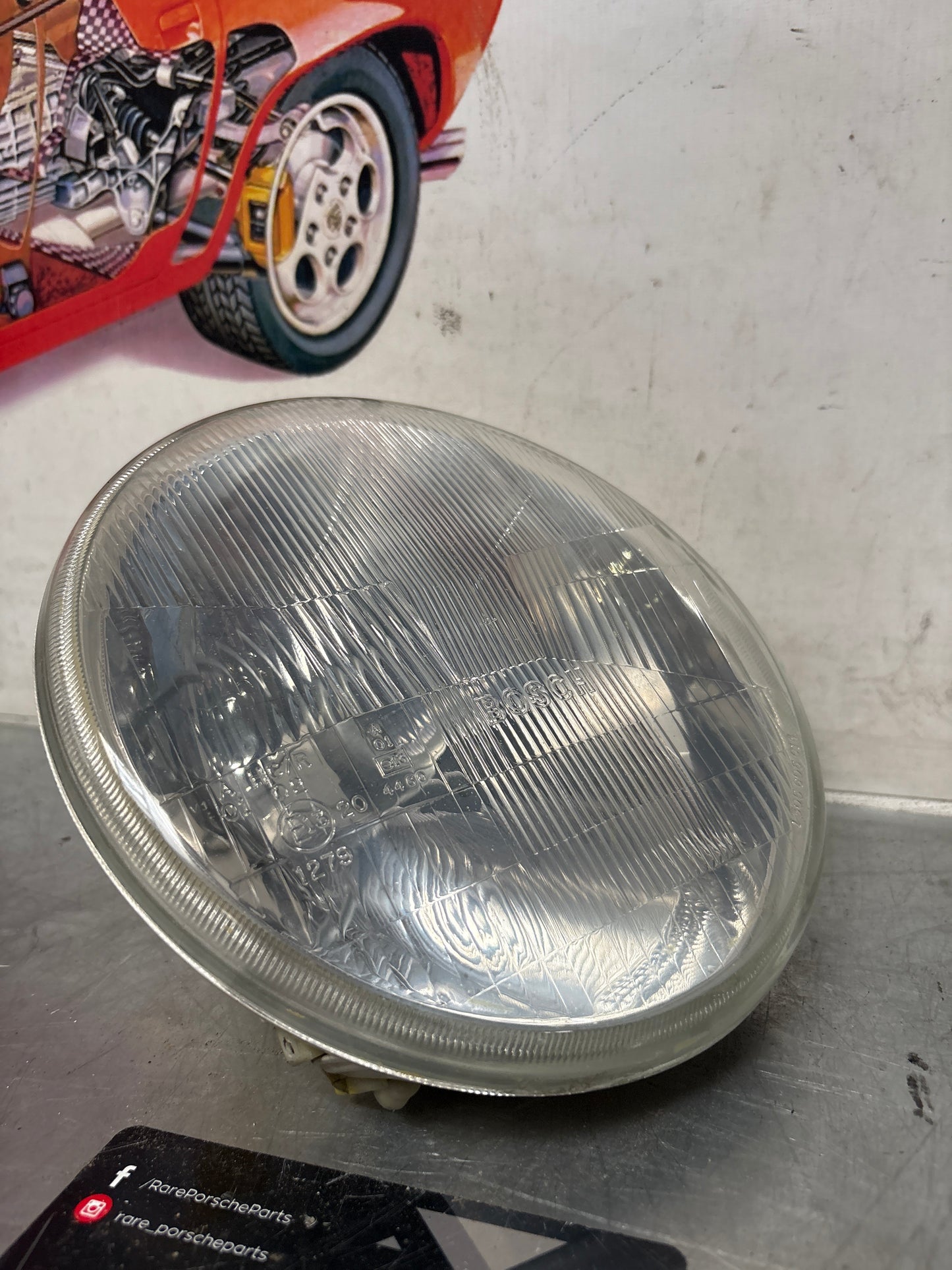 Porsche 968 right side Bosch headlight, used 94463192900 / 0301900306 / 1305304021