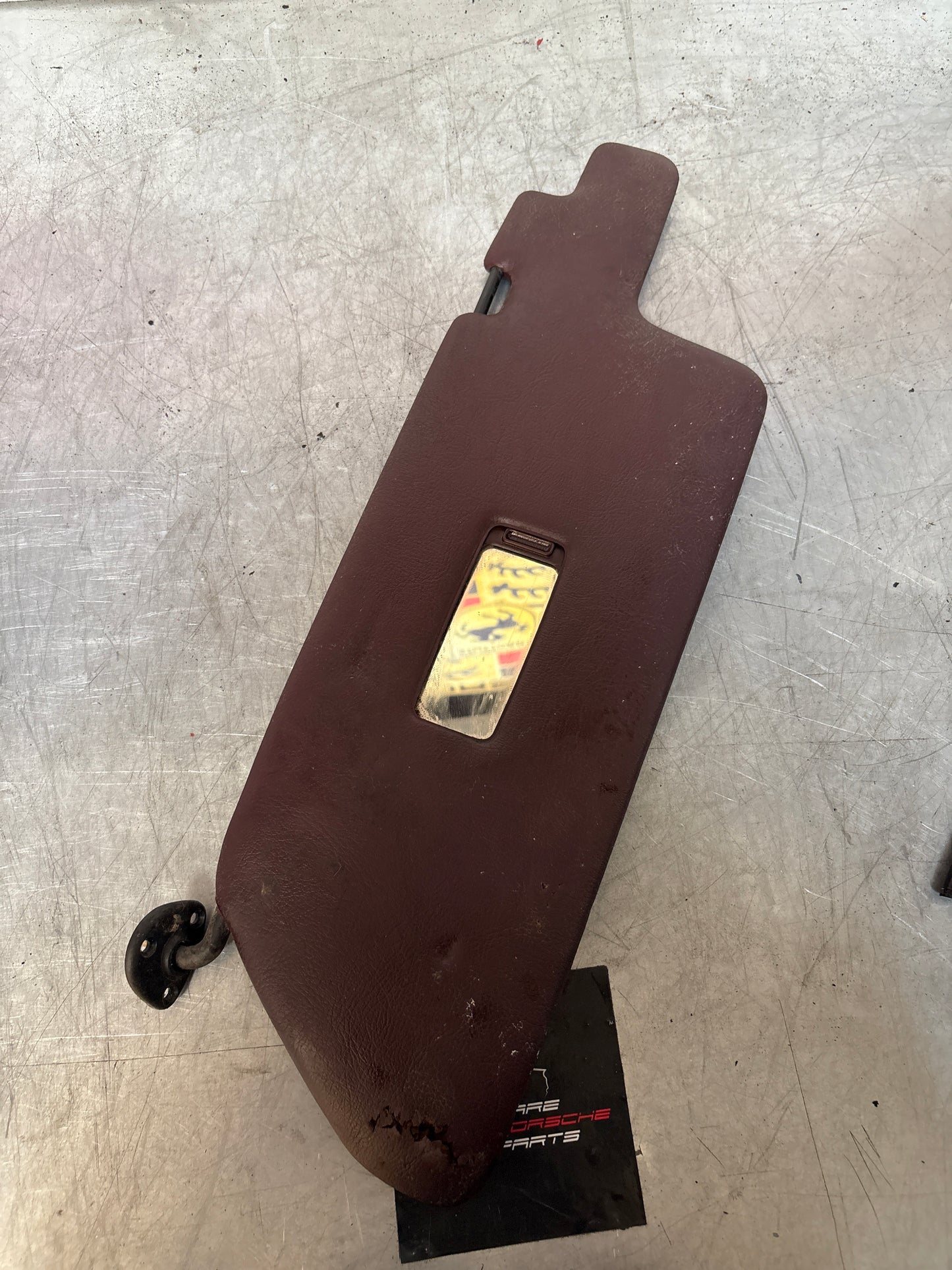 Porsche 944 left N/S sun visor in burgundy, used for late cars 94473103101