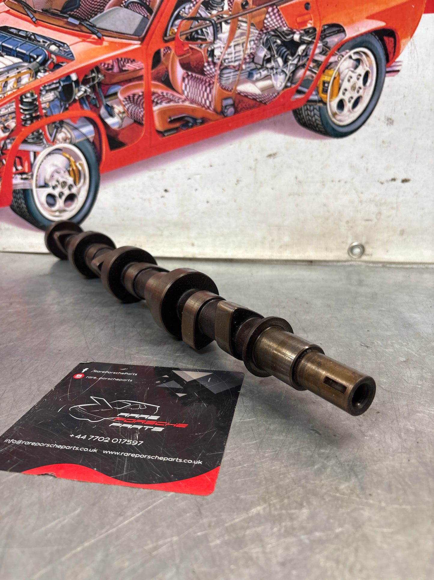 Porsche 928 cam shaft, used 9281051553R
