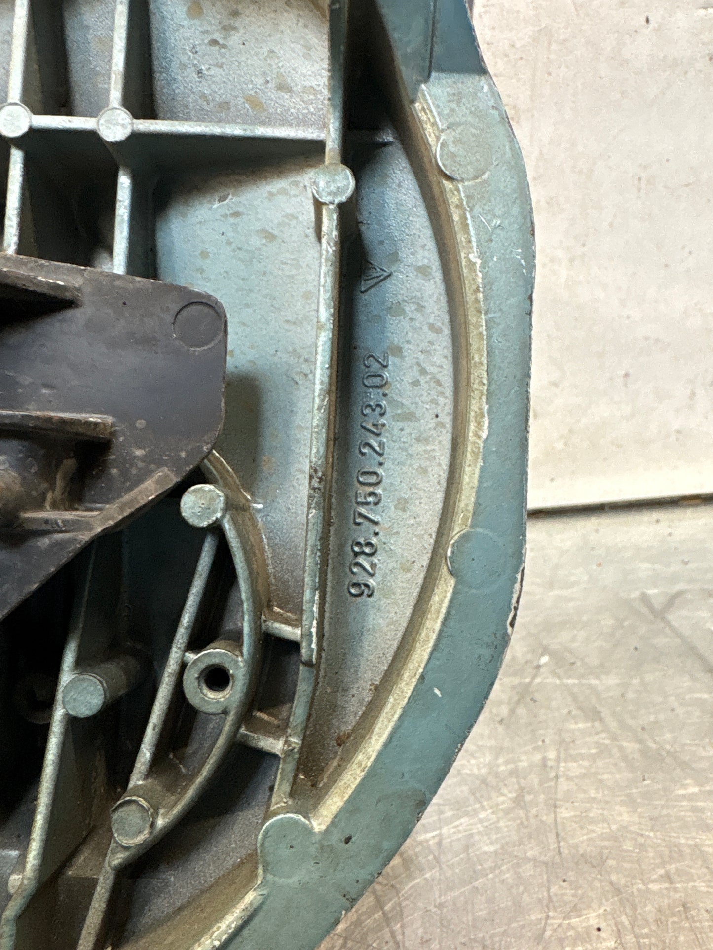 Porsche 928 left headlight swivel frame 92875024902 92875024302 used