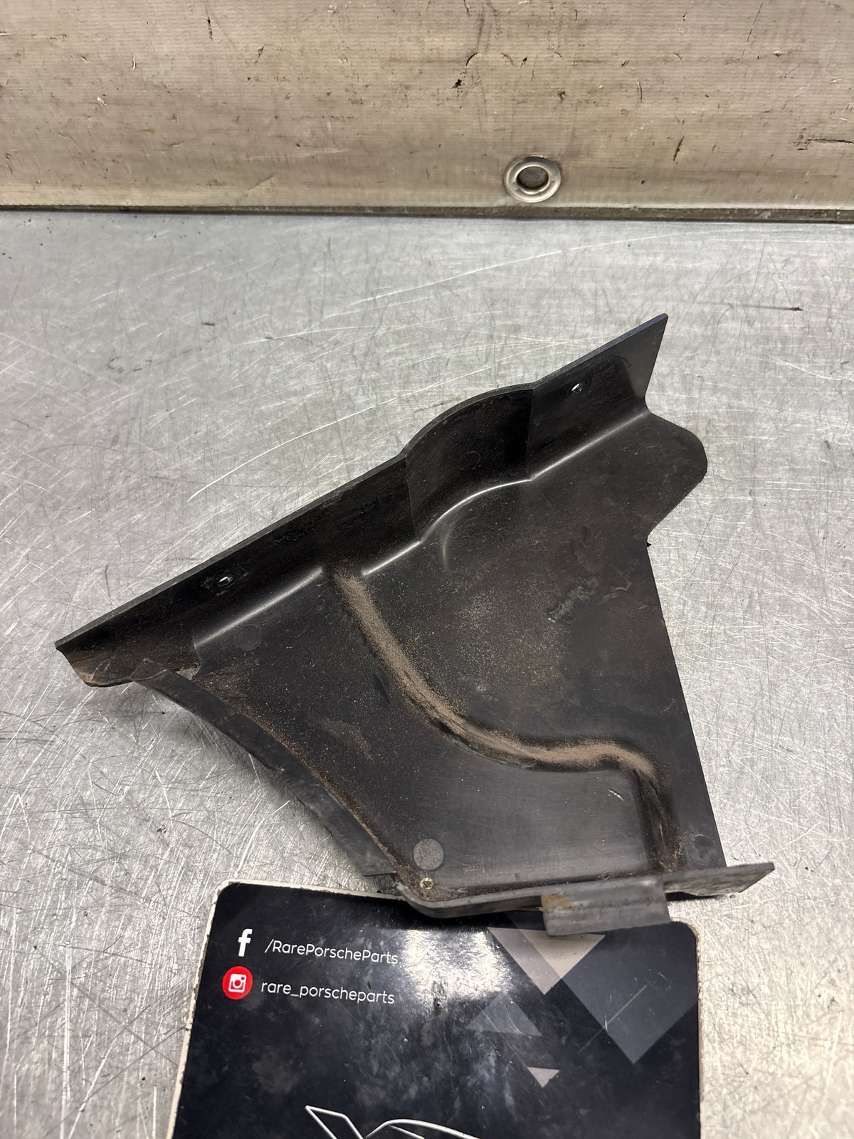 Porsche 914 headlight motor protective plate, right side, used 91475019610