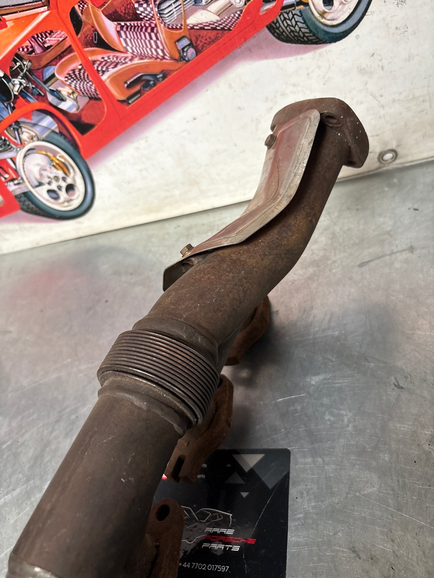 Porsche 928 S4 exhaust manifold, left 92811114507, used