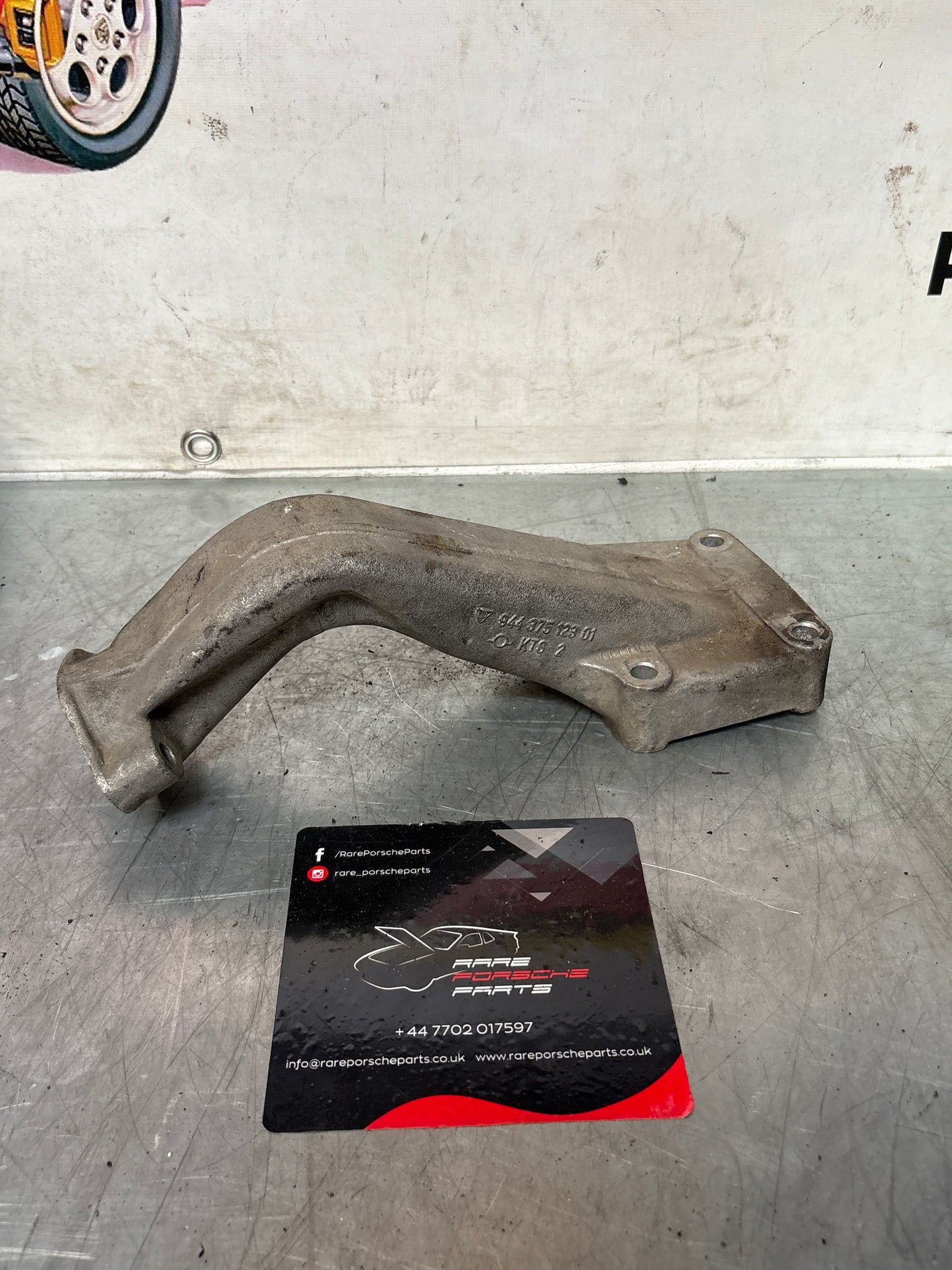 Porsche 944 engine carrier bracket, used 94437512301