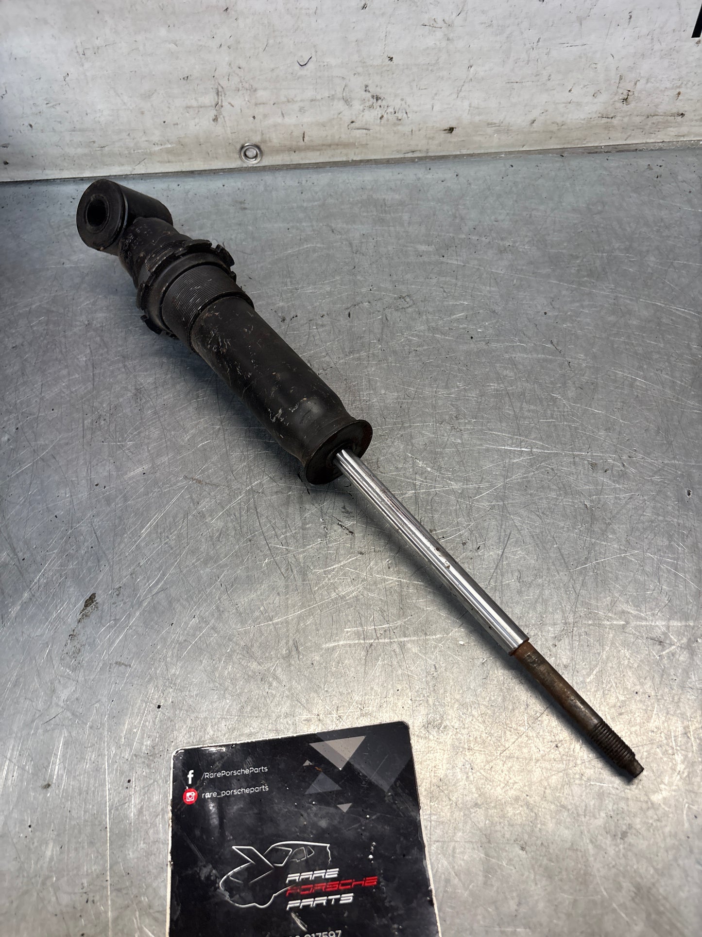 Porsche 928 rear shock absorber, used 92833305116