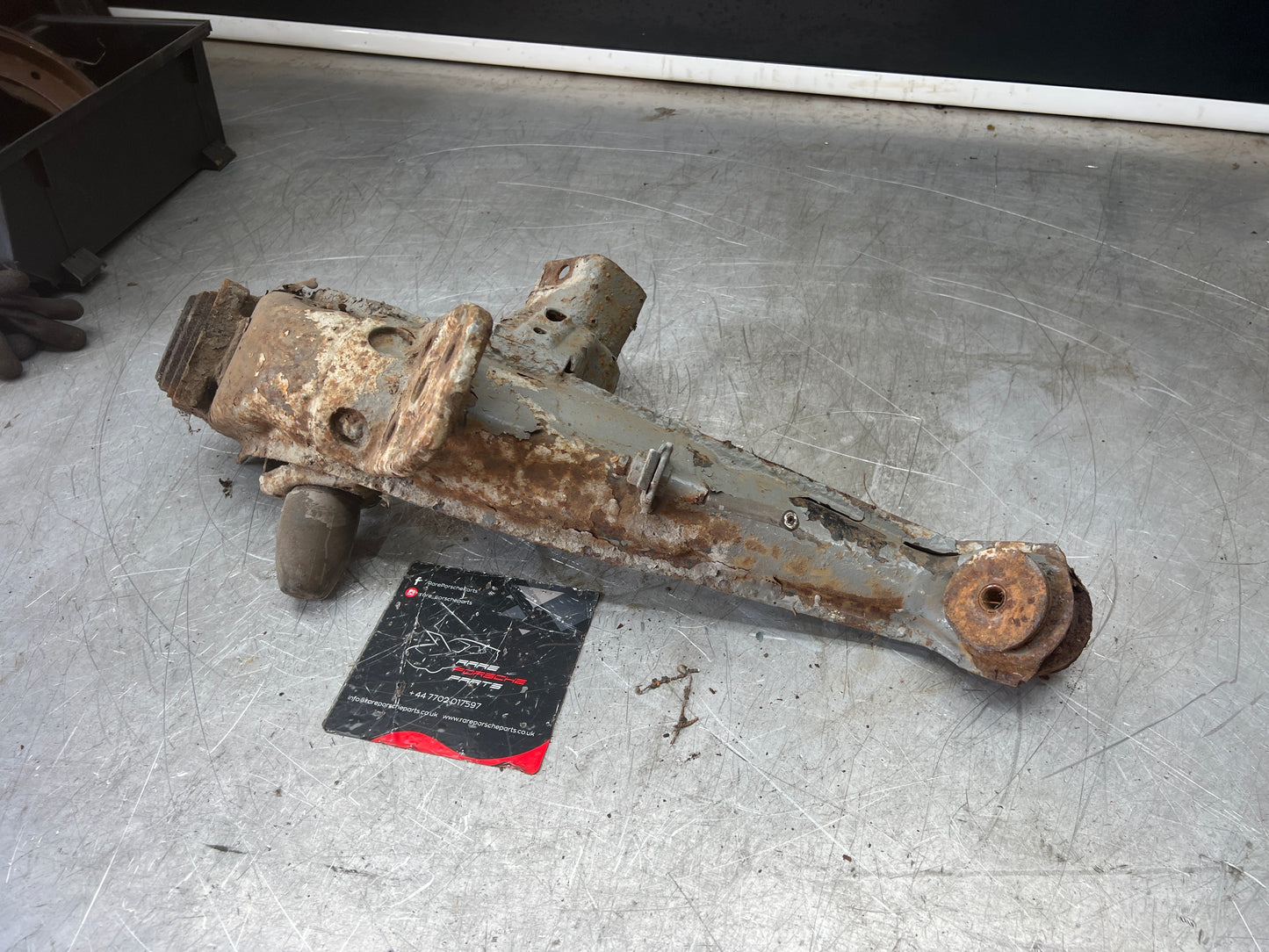 Porsche 924 944  -85.5 Rear left trailing arm, 94433102100