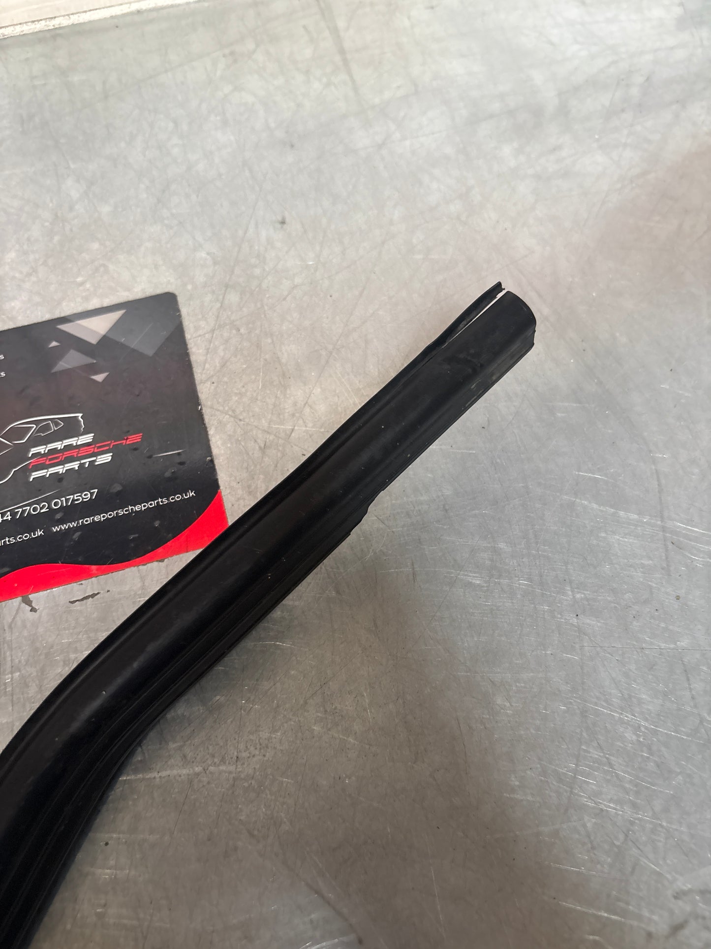 Porsche 944 85.5- left sill trim, scuff plate used 94455112100 cracked