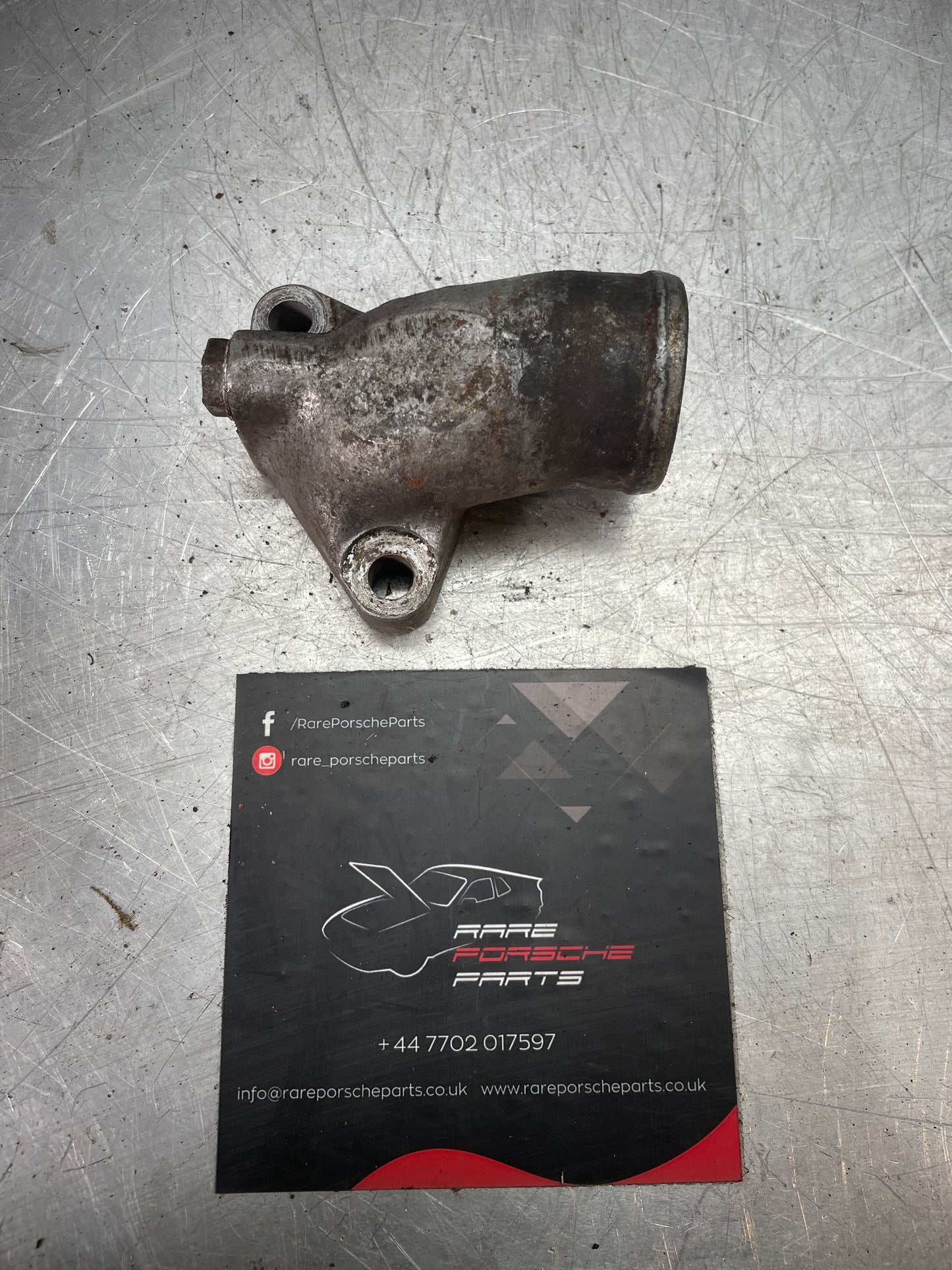 Porsche 944 Turbo water outlet, used 9511043150R