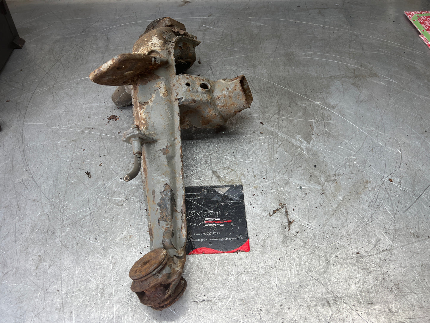 Porsche 924 944  -85.5 Rear left trailing arm, 94433102100