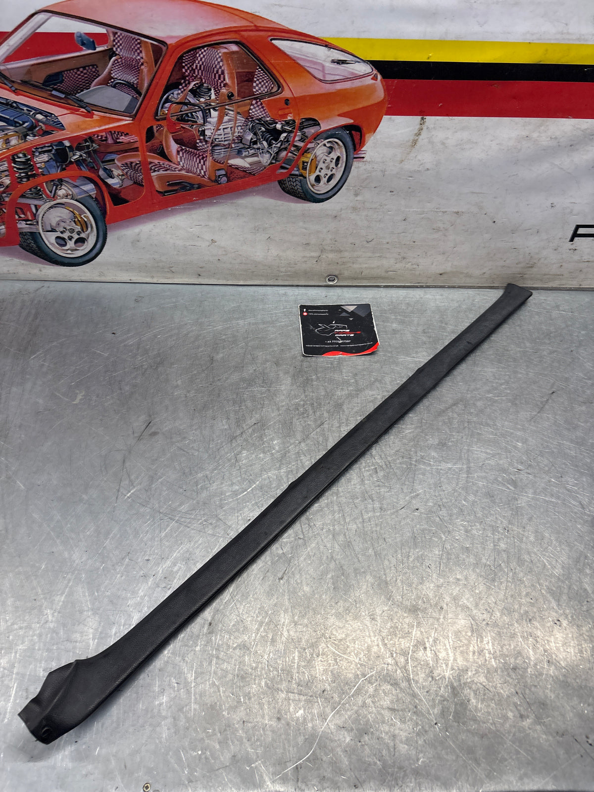 Porsche 928 tailgate trim, left, near side, black, 92855503702, used