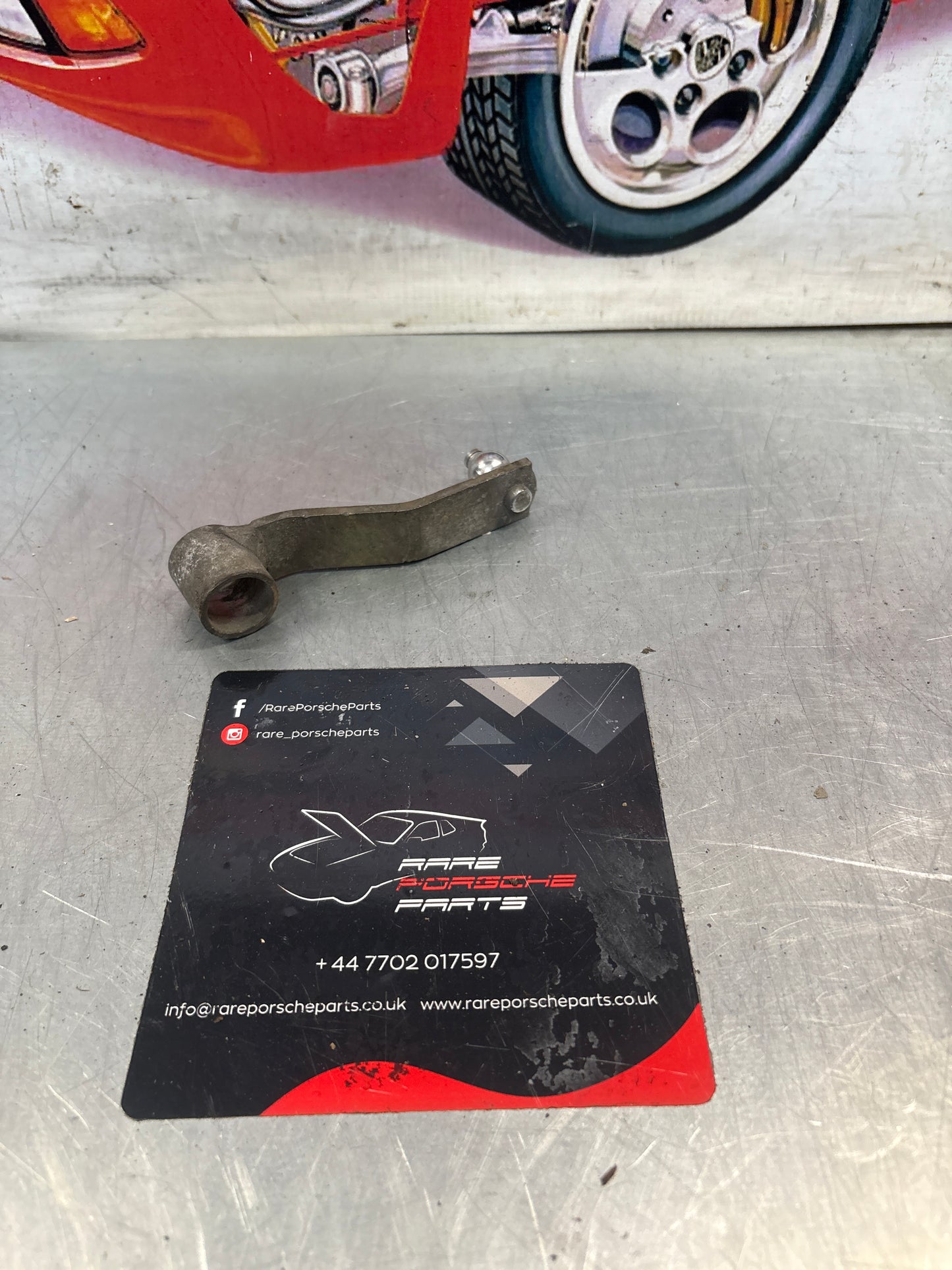 Porsche 924/944 headlight lever, used 477805651