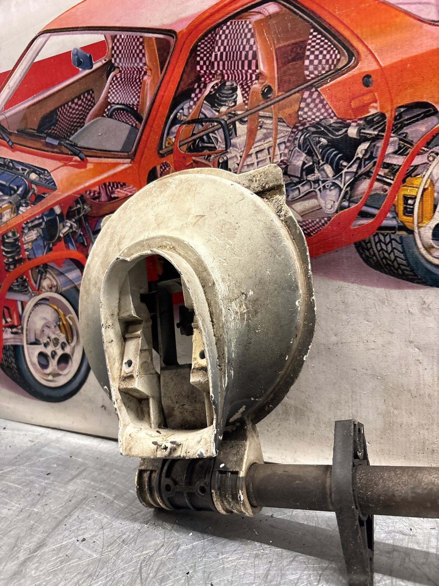 Porsche 928 left headlight swivel frame 92875024902 92875024302 used