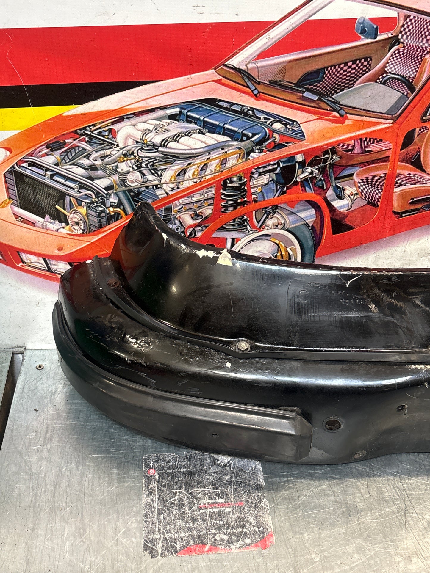 Porsche 911 930 rear bumper with skirt, used 93050511201