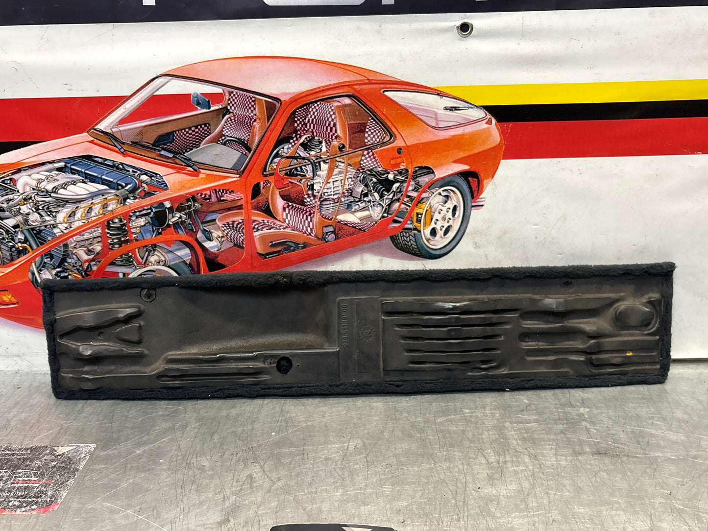 Porsche 928 black carpeted Tool kit panel cover, used 92855118106