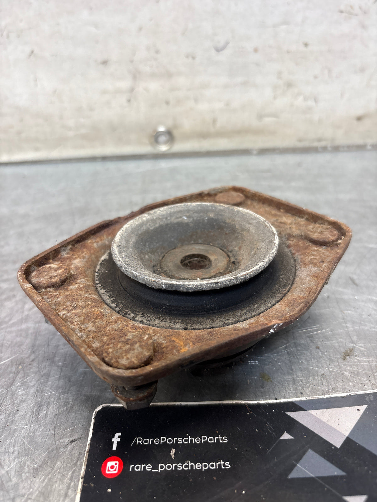 Porsche 924 / 944 front suspension bearing flange, 477412345, used