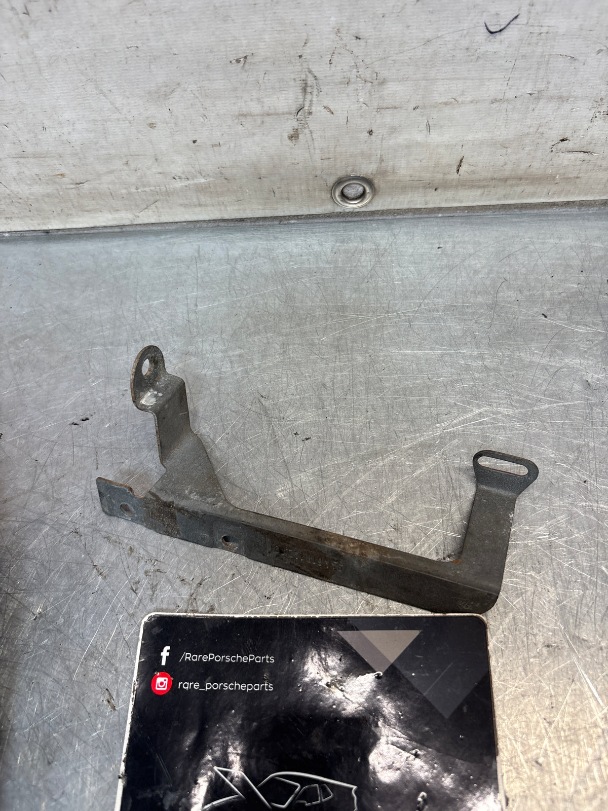 Porsche 944 steering coloumn bracket, right, used 94461814200