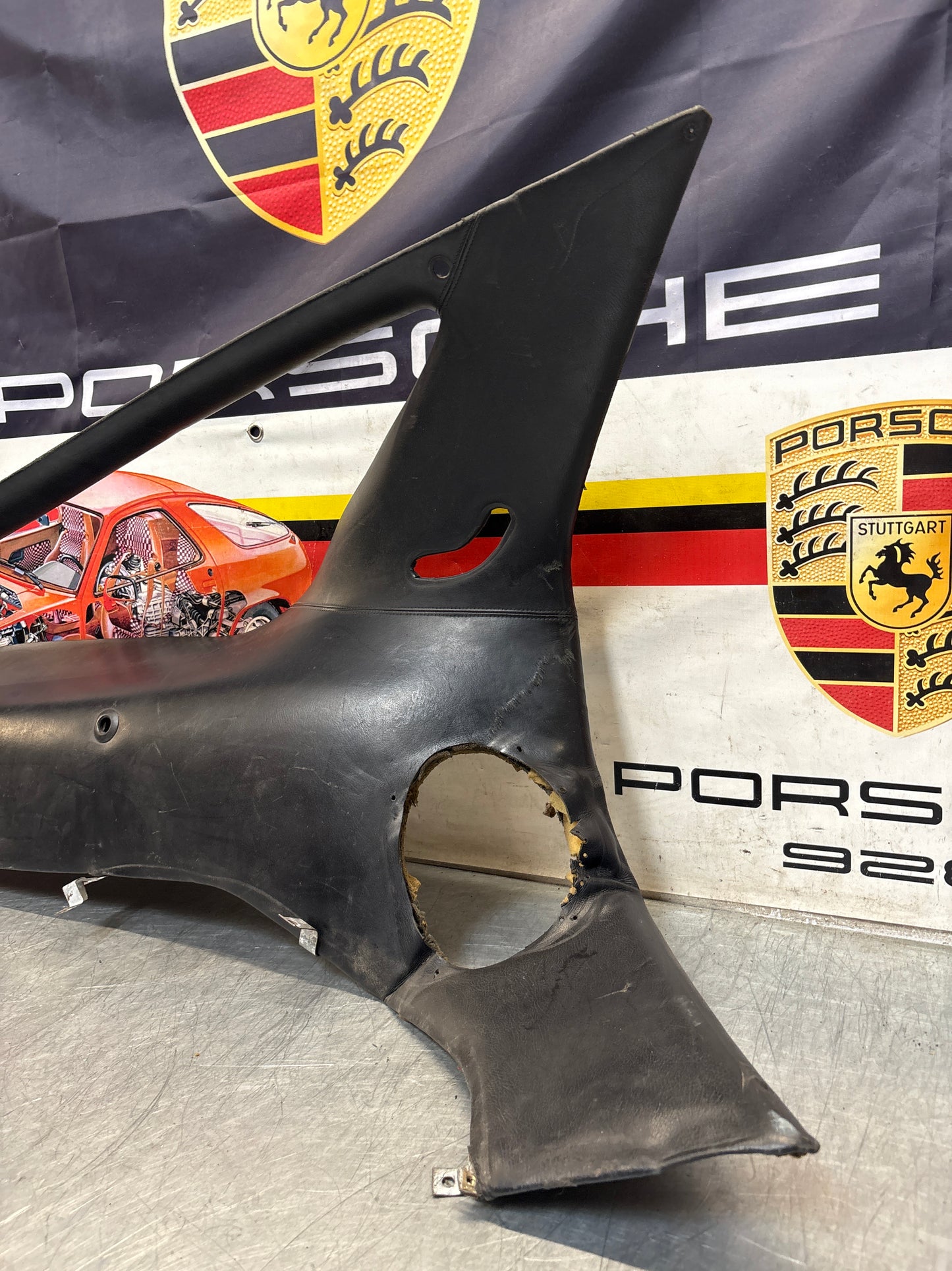 Porsche 928 early left side lower side trim panel, without loudspeaker, black used 92855502102