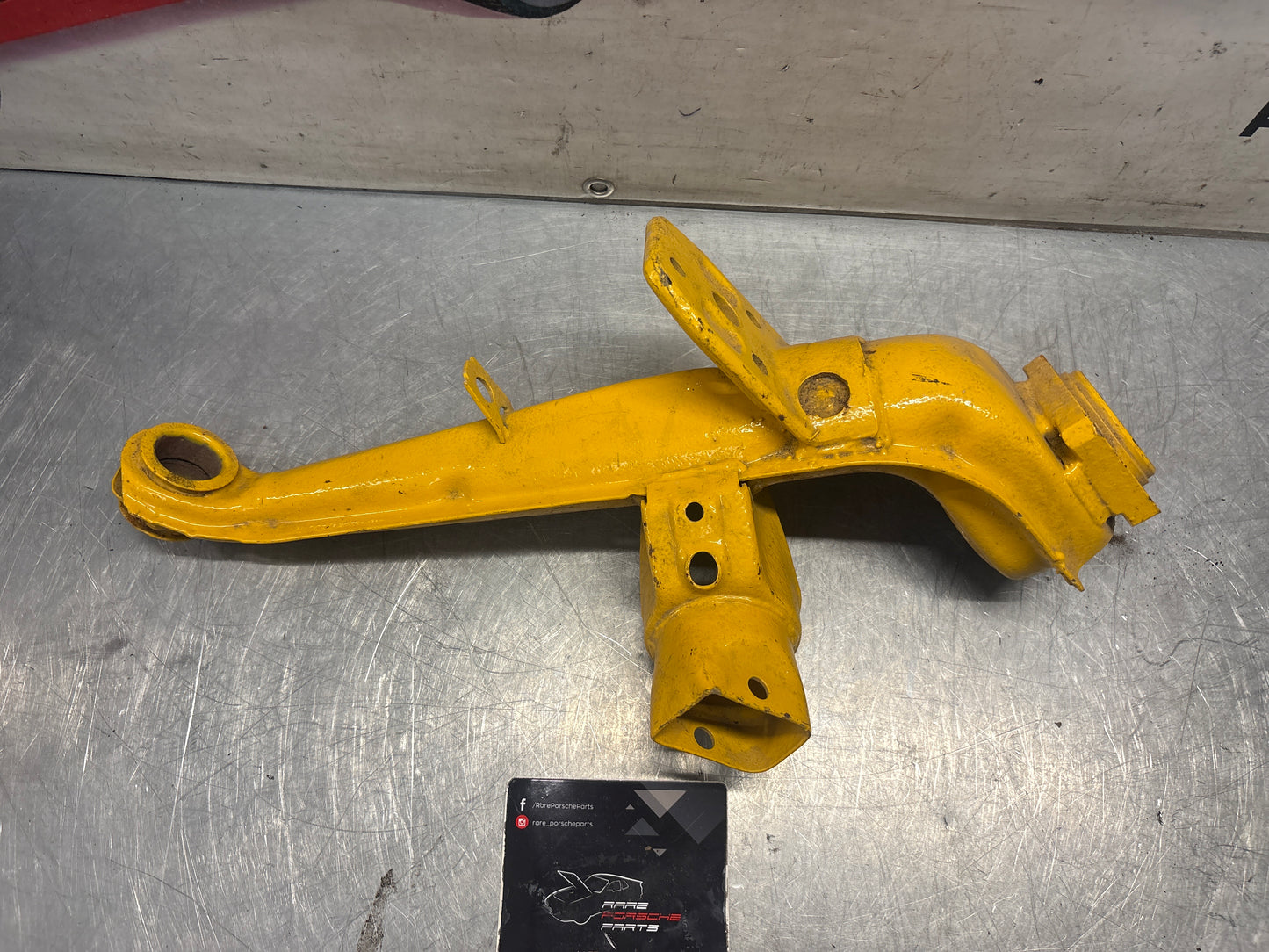 Porsche 924 944  -85.5 Rear left trailing arm,  refurbished 94433102100