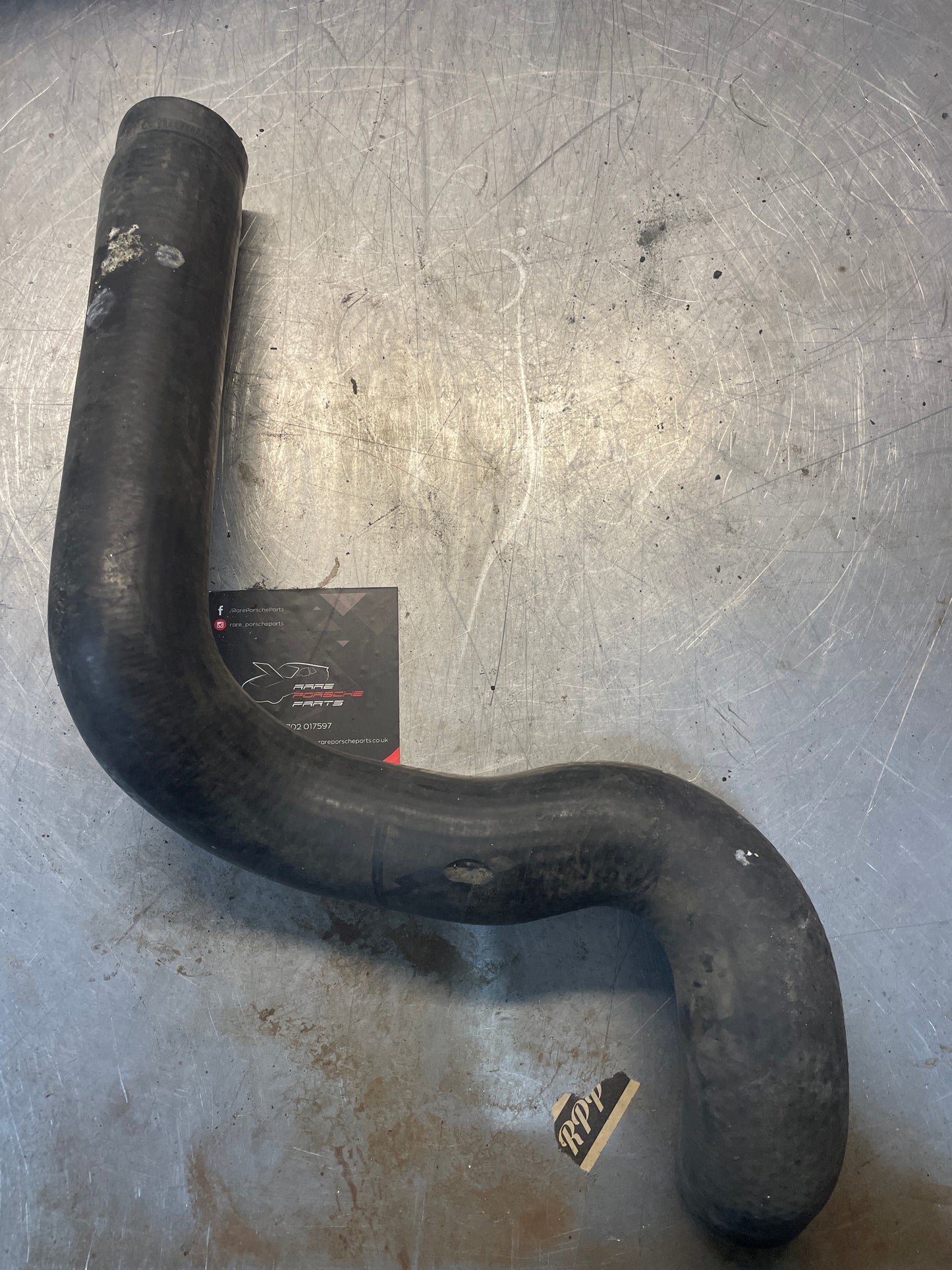 Porsche 928 radiator water hose, used 928106239