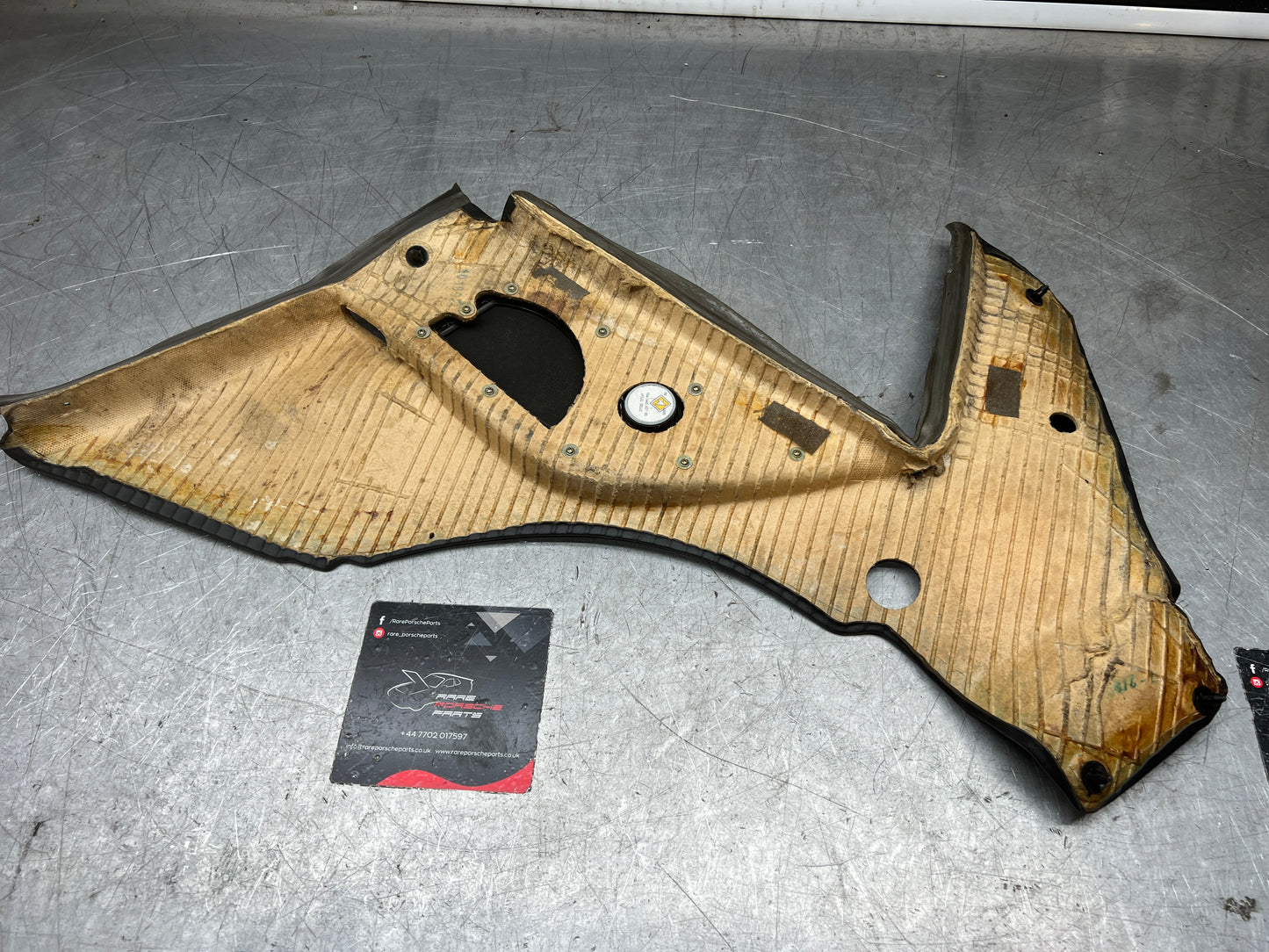 Porsche 944 Left Rear Quarter Trim Card, black  - used 944555021 M490 sound pack