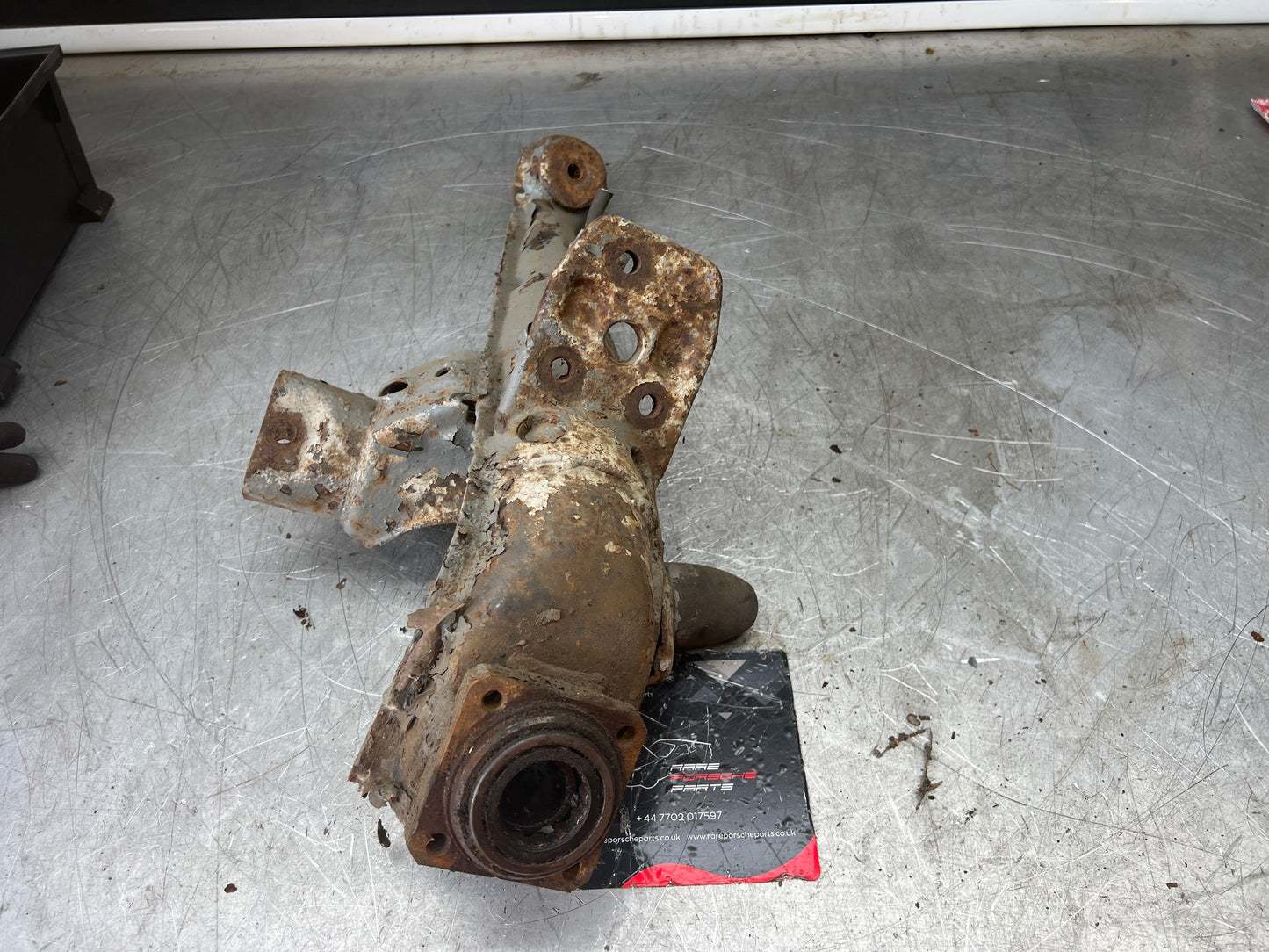 Porsche 924 944  -85.5 Rear left trailing arm, 94433102100