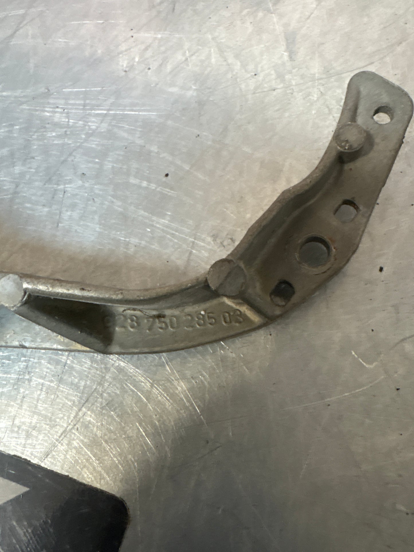 Porsche 928 headlight support arm, used 92875028503