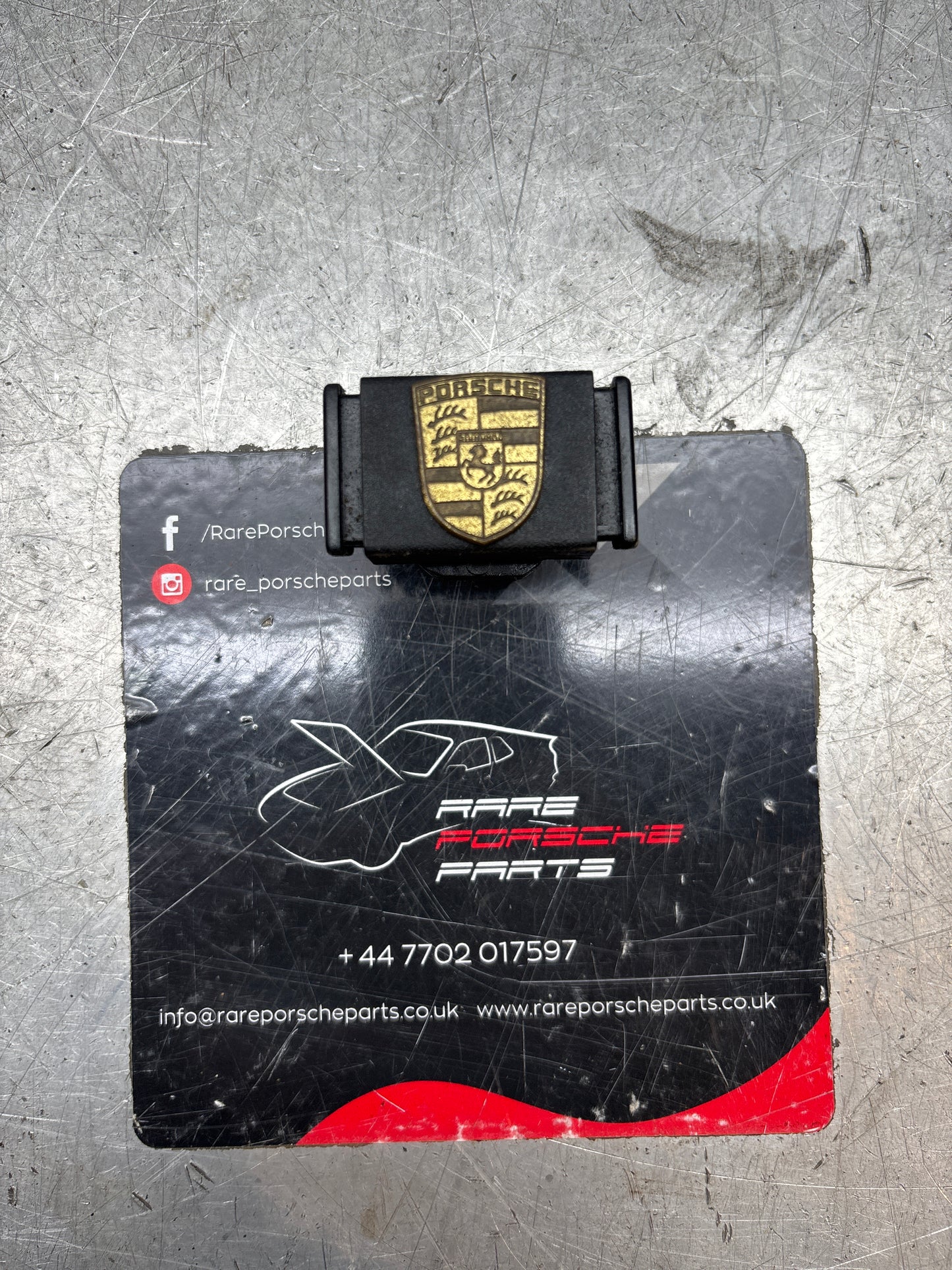 Porsche 924/944 black glove box lock with badge 477857133 used immaculate