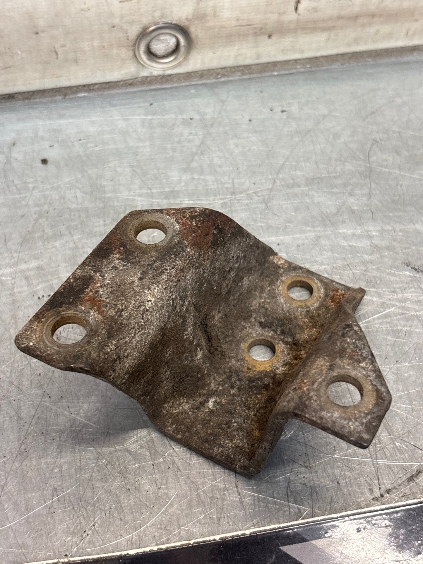 Porsche 924 944 hook trestle bracket, right, used 477399168E