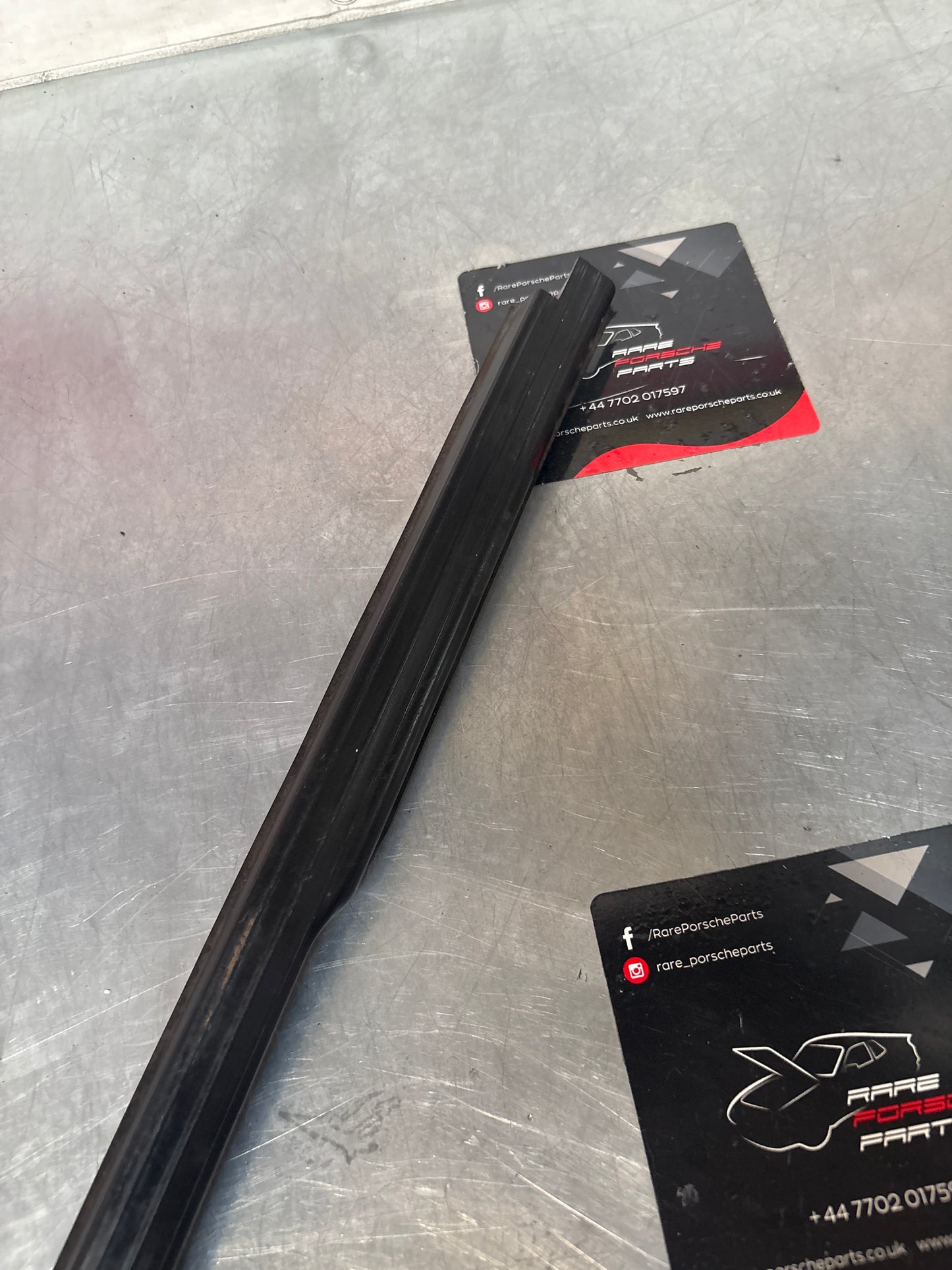 Porsche 944 85.5- left sill trim, scuff plate used 94455112100 cracked