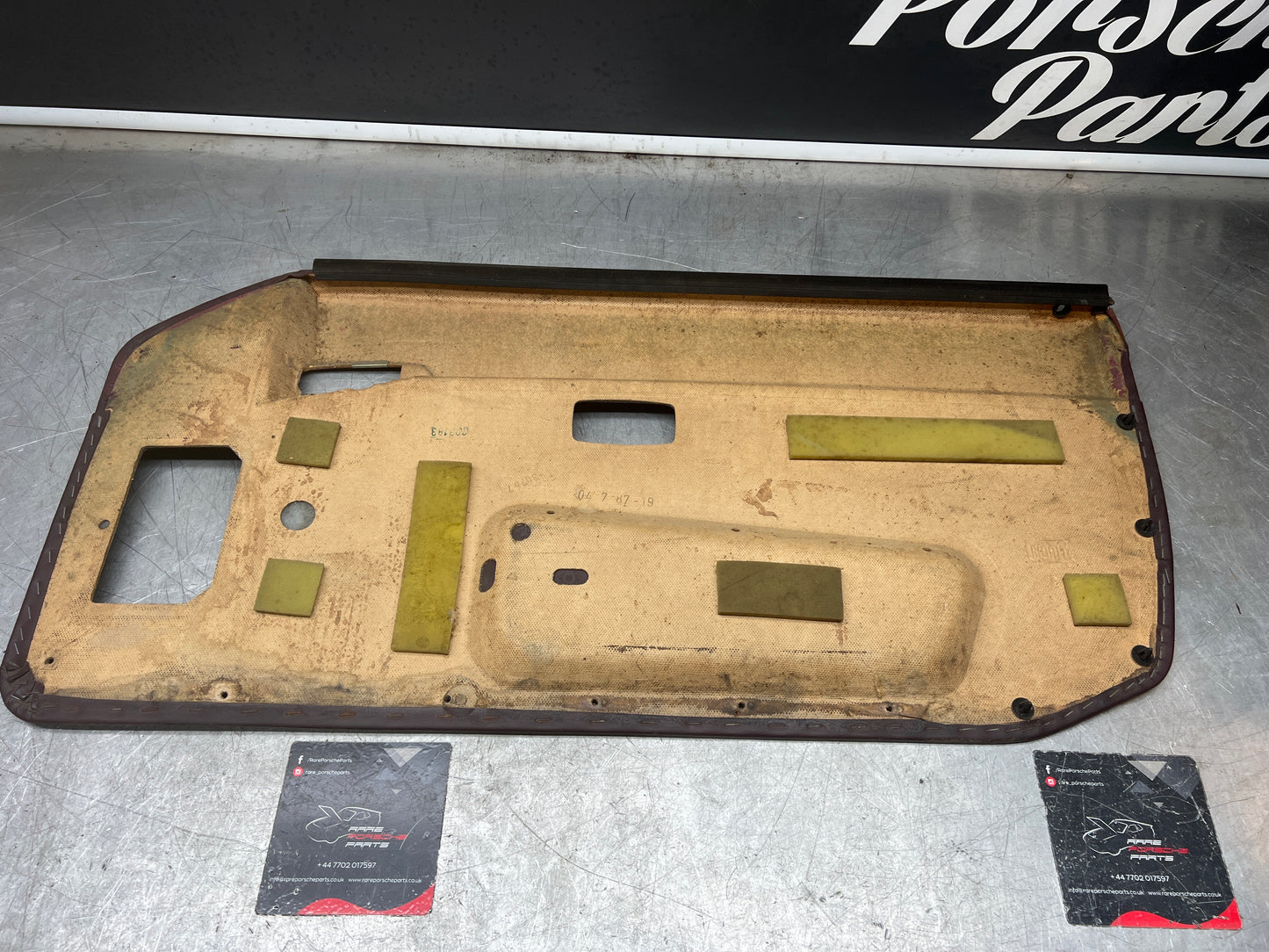 Porsche 944 left burgundy  door card for late cars from 85.5 944555017