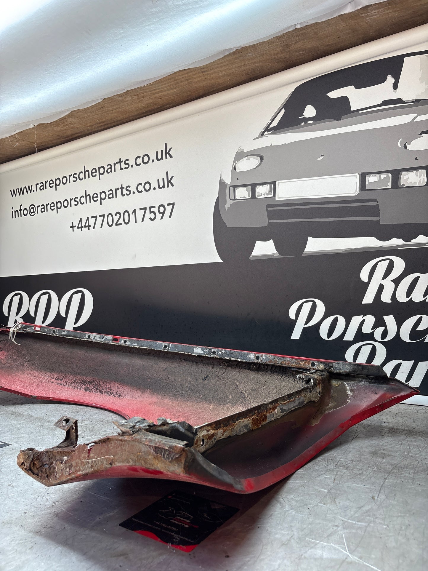 Porsche 944, early front right wing, in need of repair