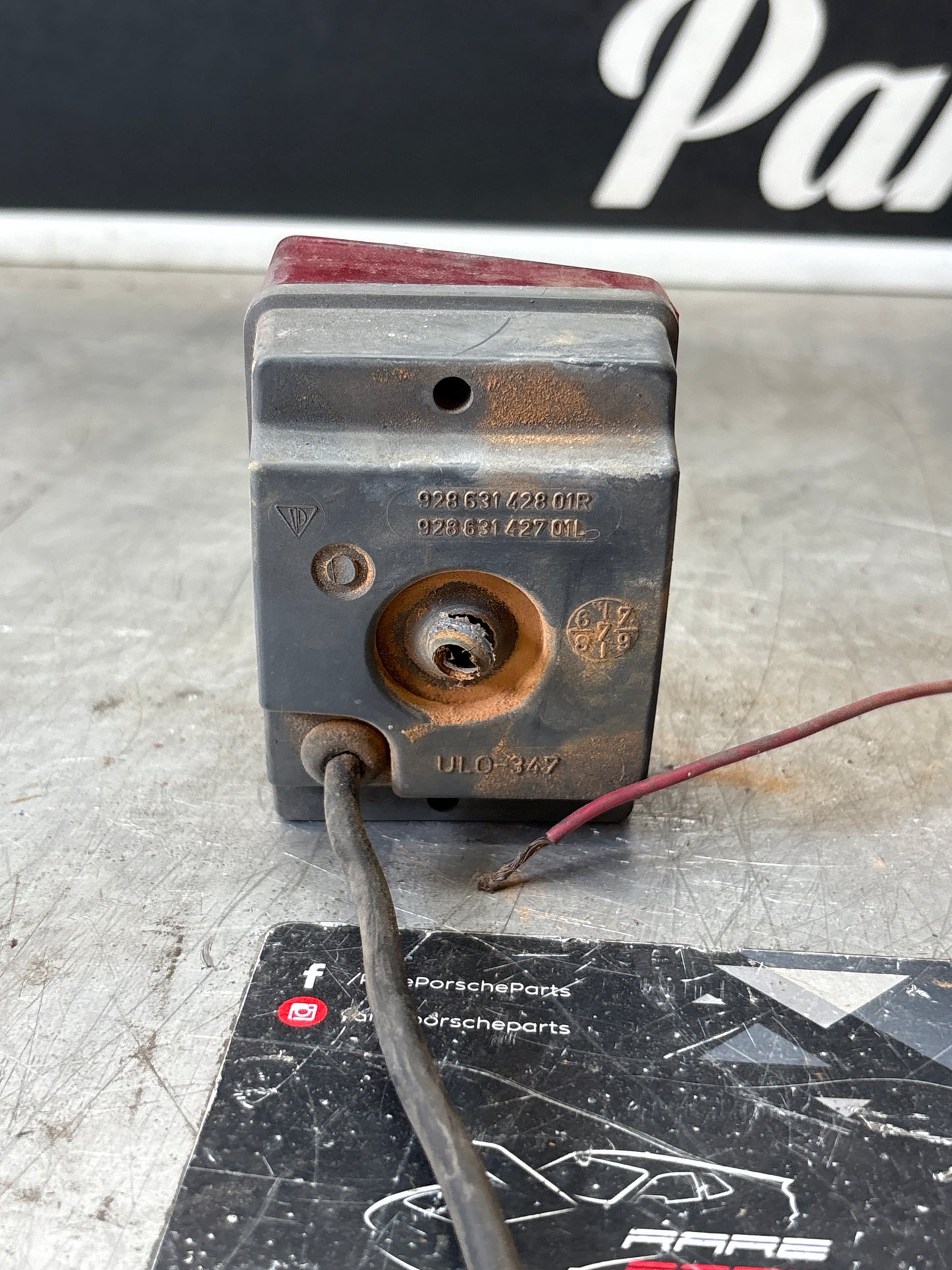 Porsche 928 left rear fogliht, used 92863142801R / 92863142701L spares or repair