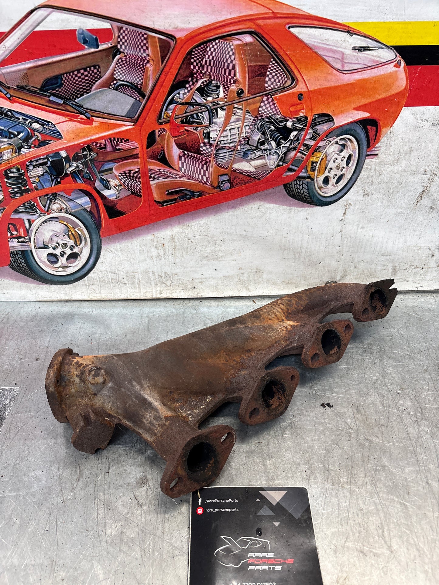 Porsche 928 right exhaust manifold, used 9281111348R
