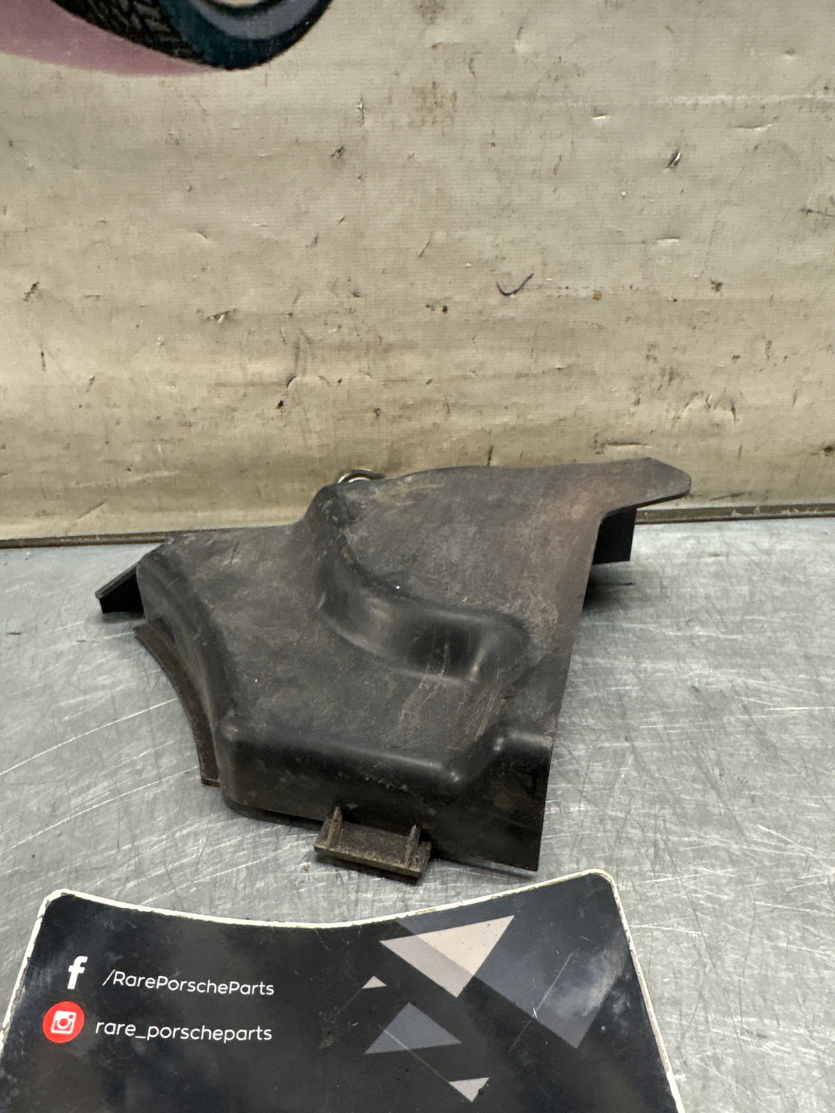 Porsche 914 headlight motor protective plate, left side, used 91475019510