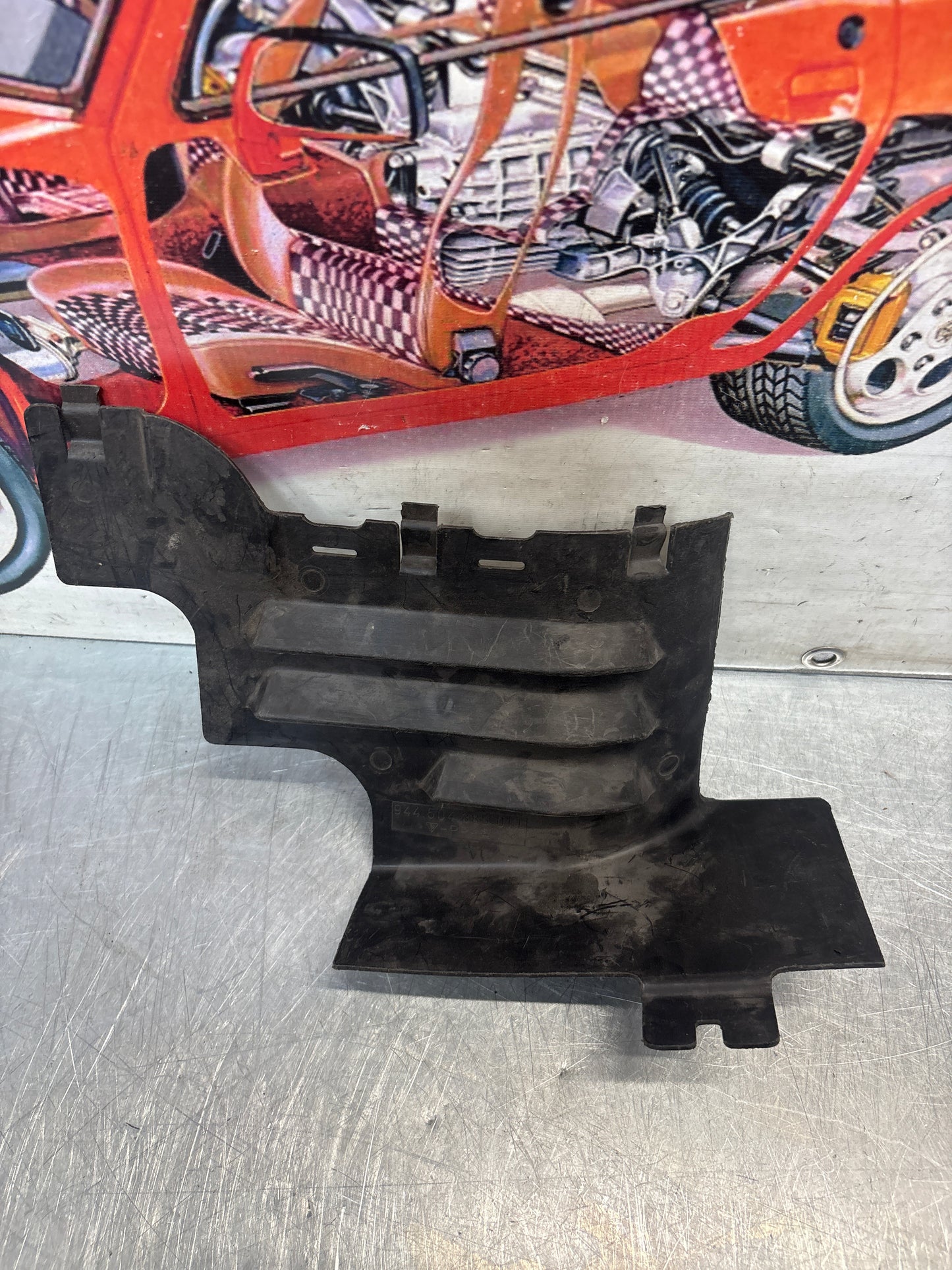 Porsche 968 left front wheel housing extension, genuine 94450438501