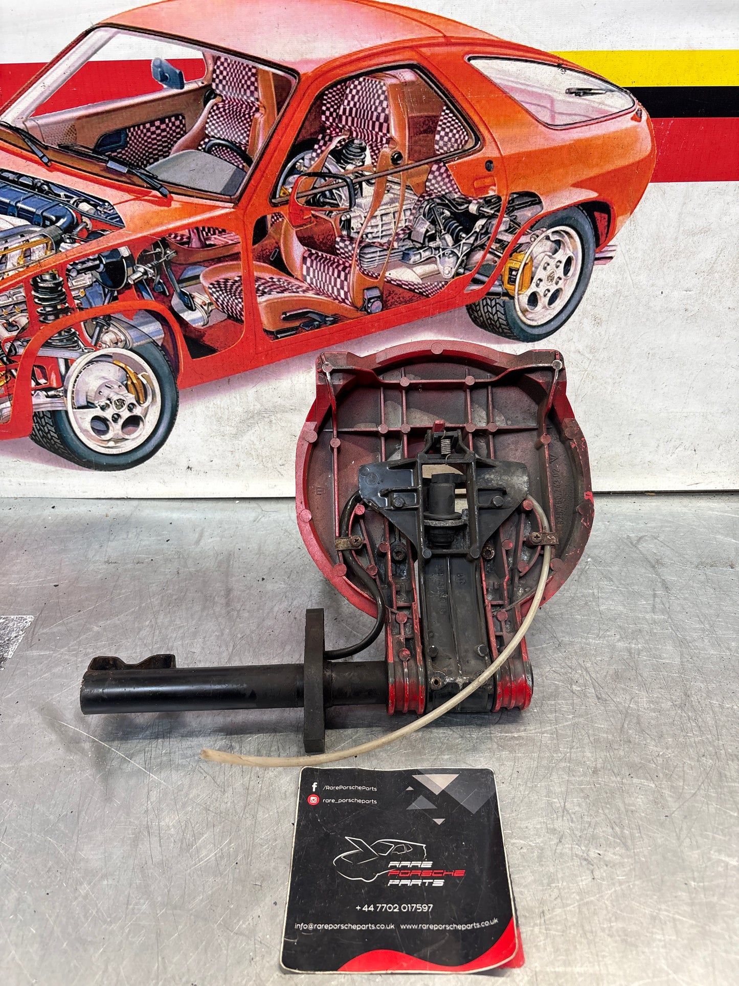 Porsche 928 left headlight swivel frame 92875024902 92875024302 used