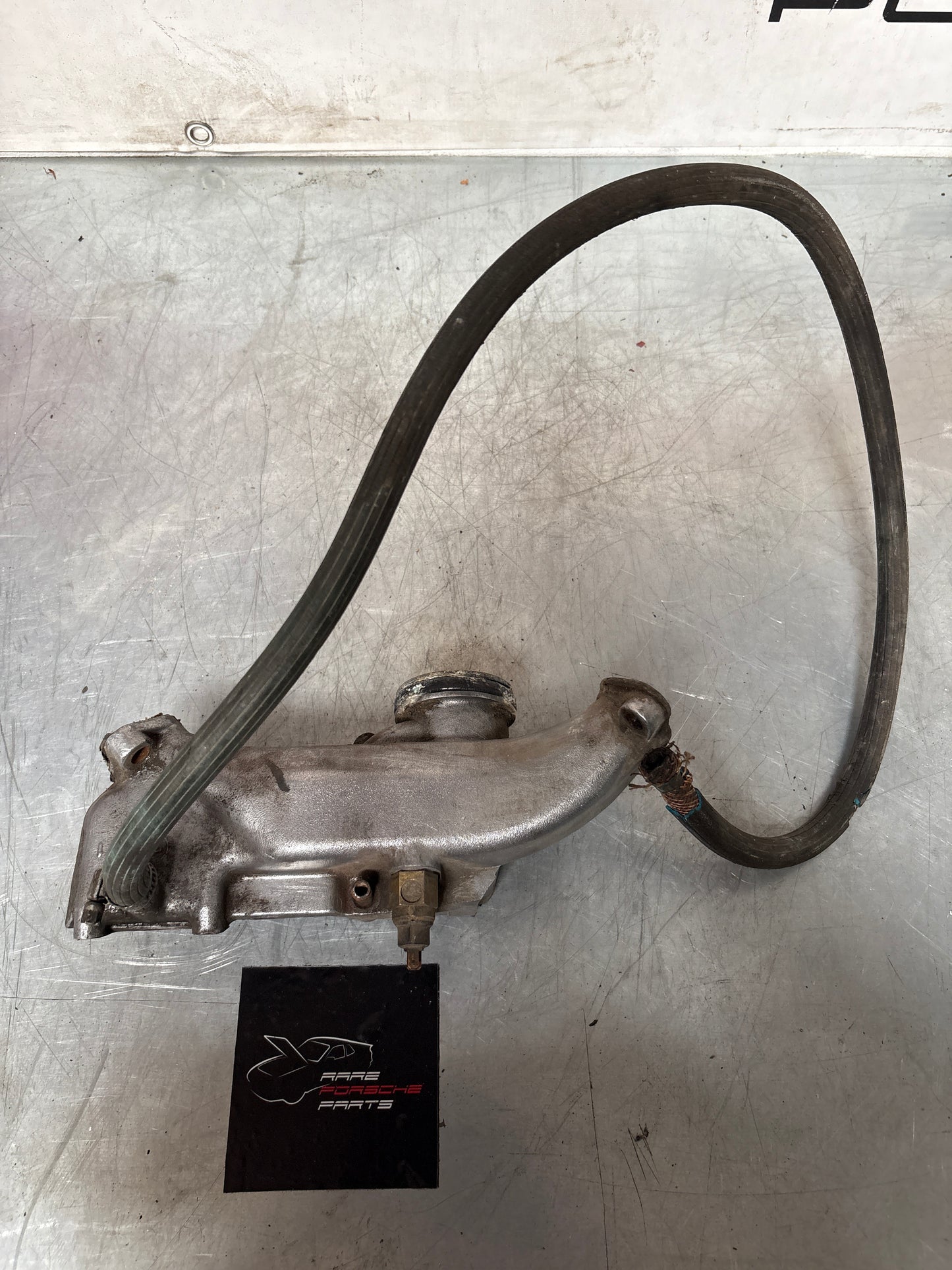 Porsche 928 thermostat housing, used 9281061616R