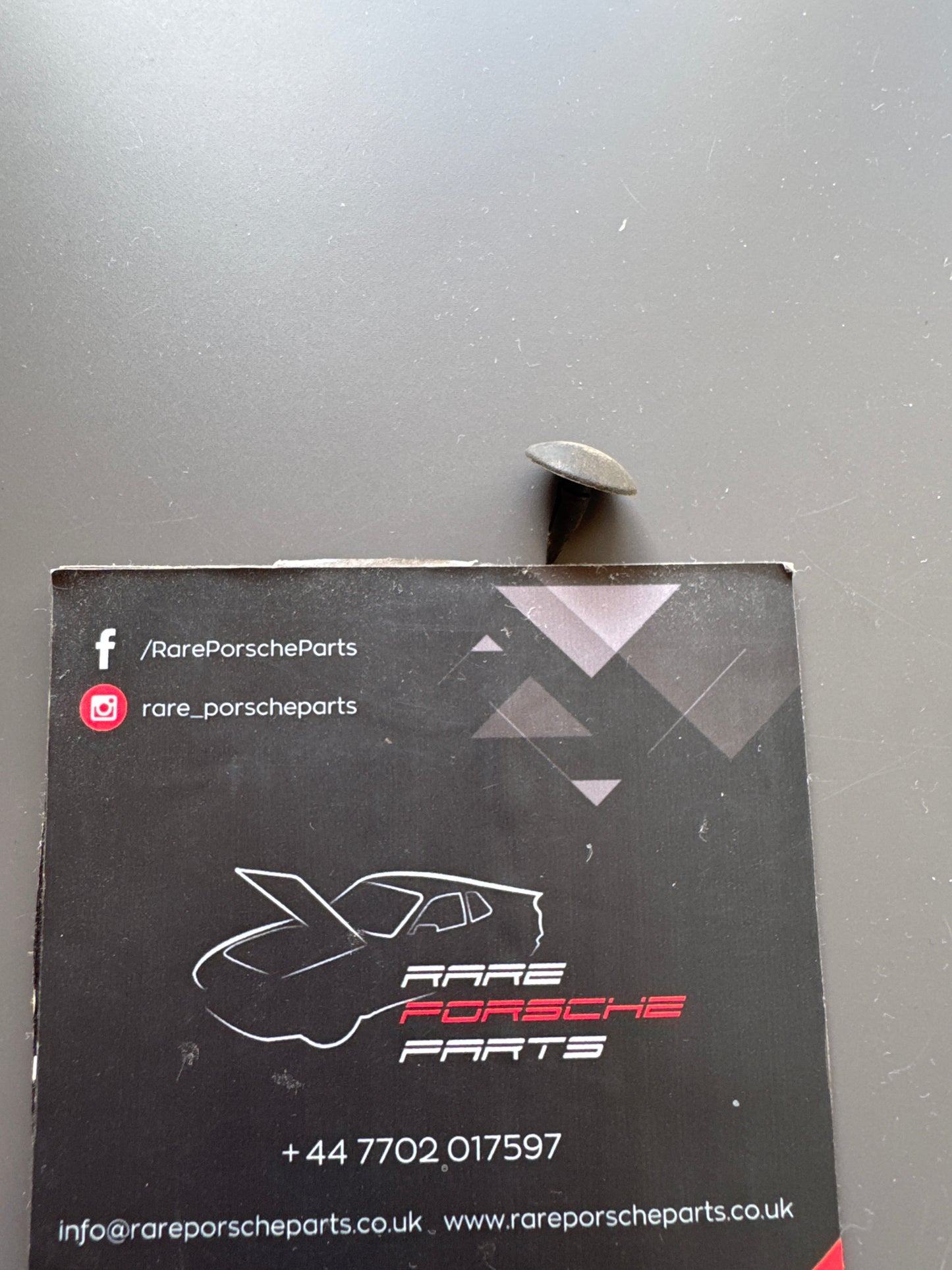 Porsche 924 / 944 pointy plug behind top of the front tower