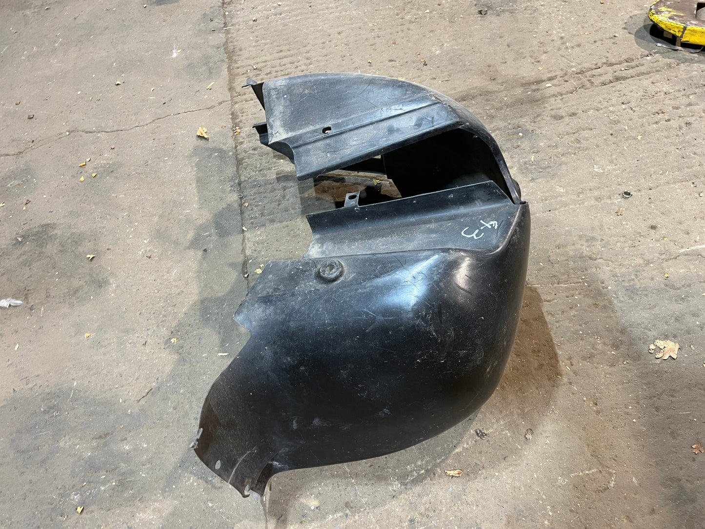 Porsche 944 from 85.5 wheel arch liner  Left, 94450438100 Used