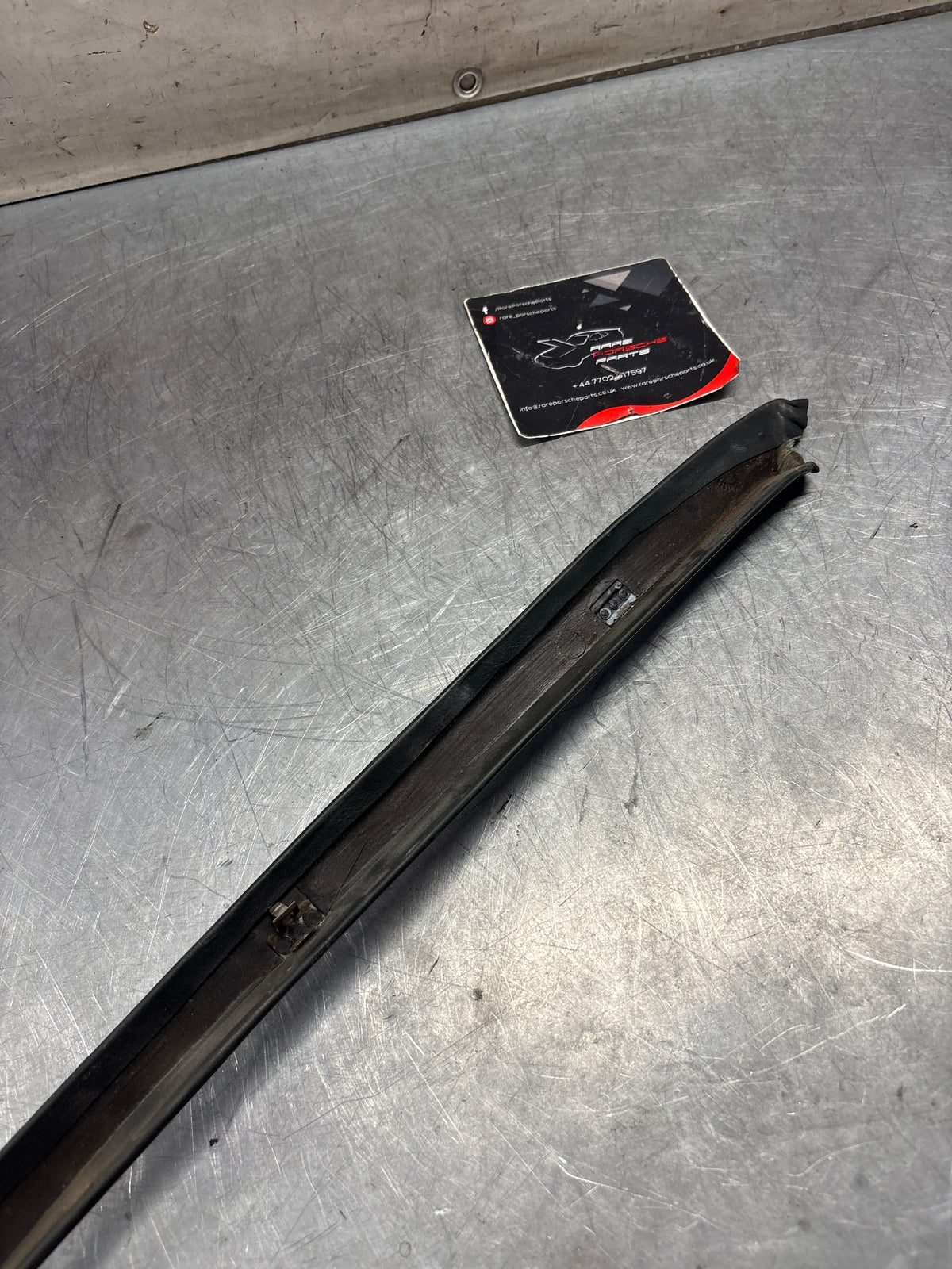 Porsche 928 right, off side door upper frame surround trim, green 92855502602, used