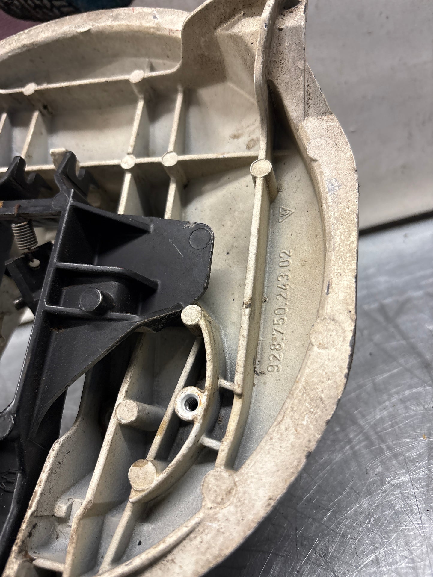 Porsche 928 left headlight swivel frame 92875024902 92875024302 used