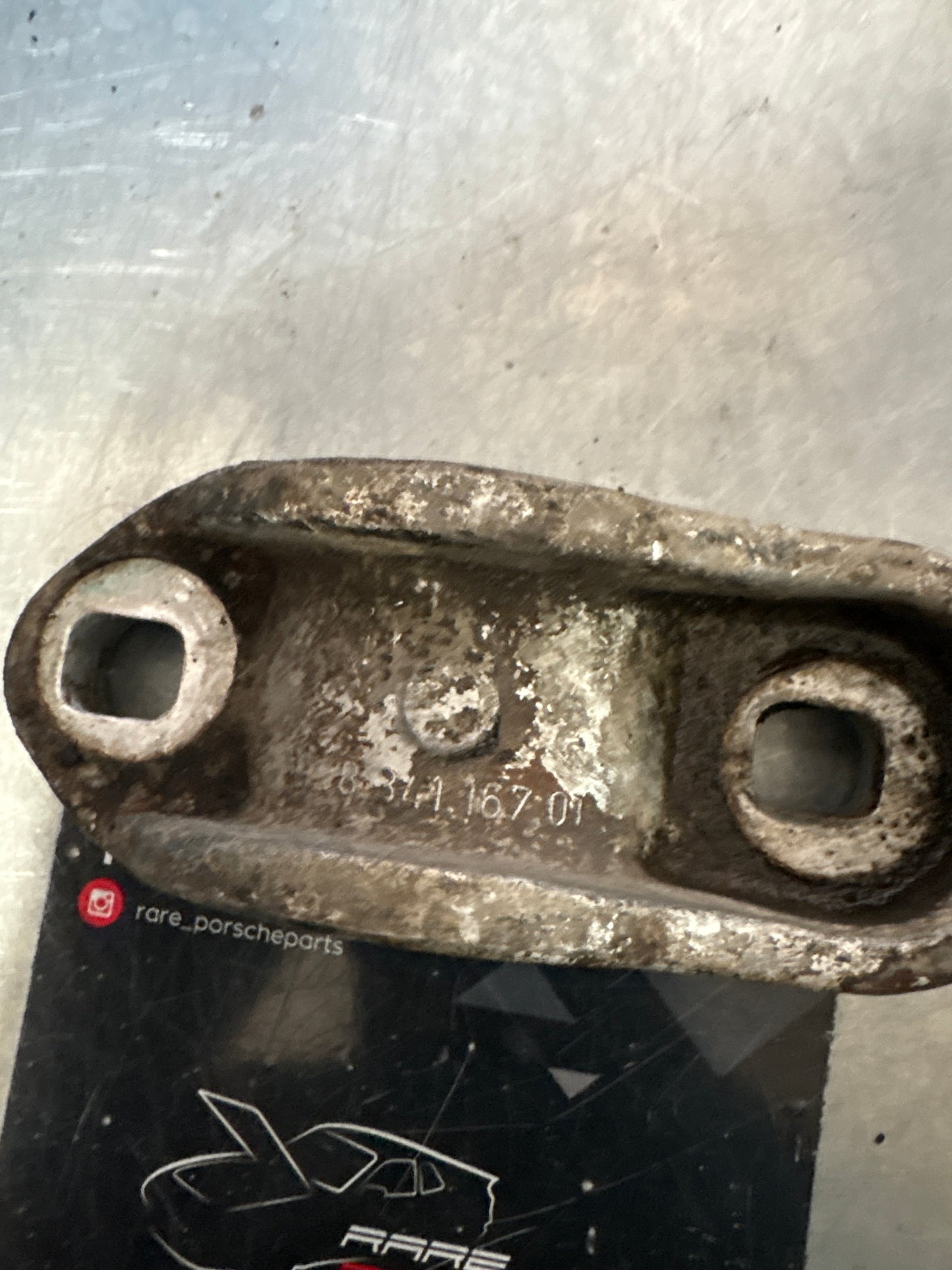 Porsche 928 rear left shock absorber bracket, used 92834116701