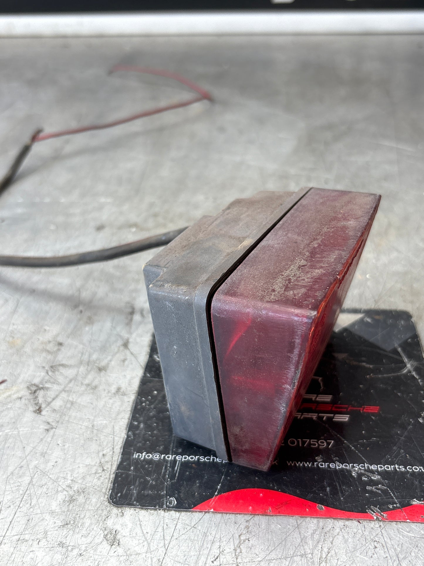 Porsche 928 left rear fogliht, used 92863142801R / 92863142701L spares or repair