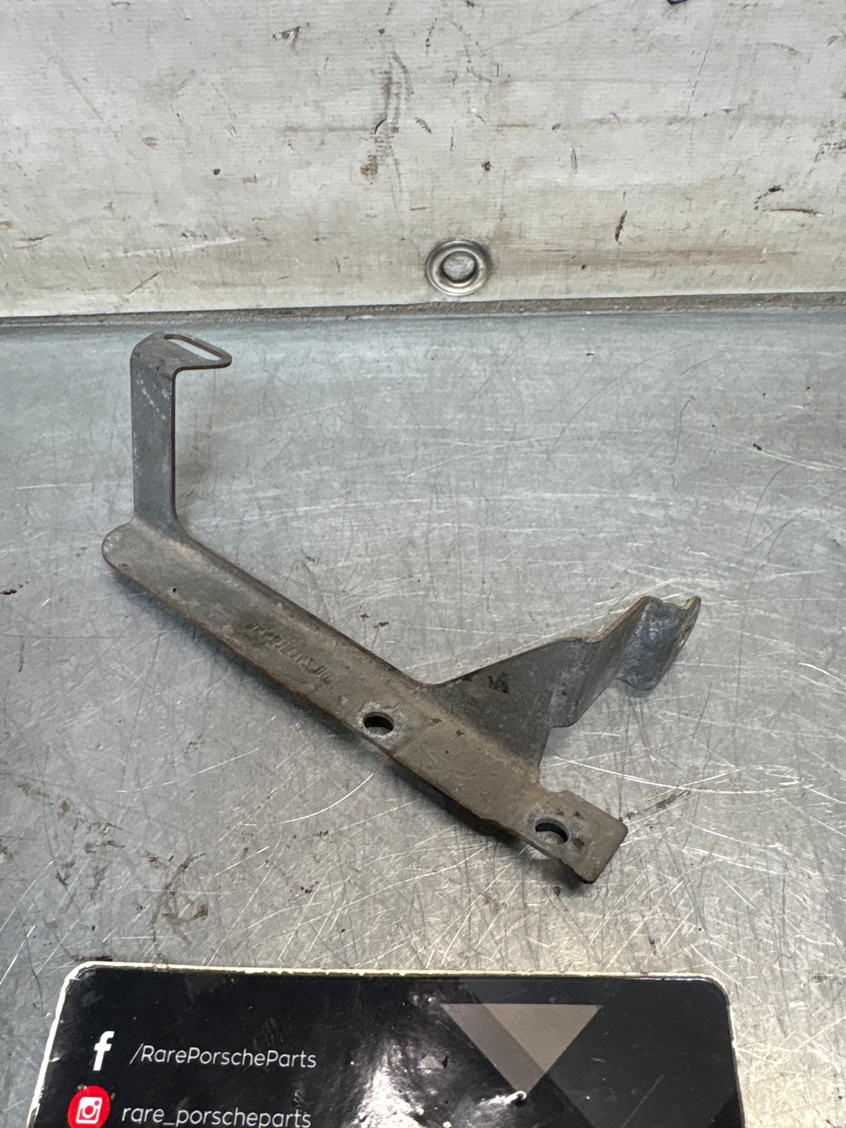 Porsche 944 steering coloumn bracket, right, used 94461814200