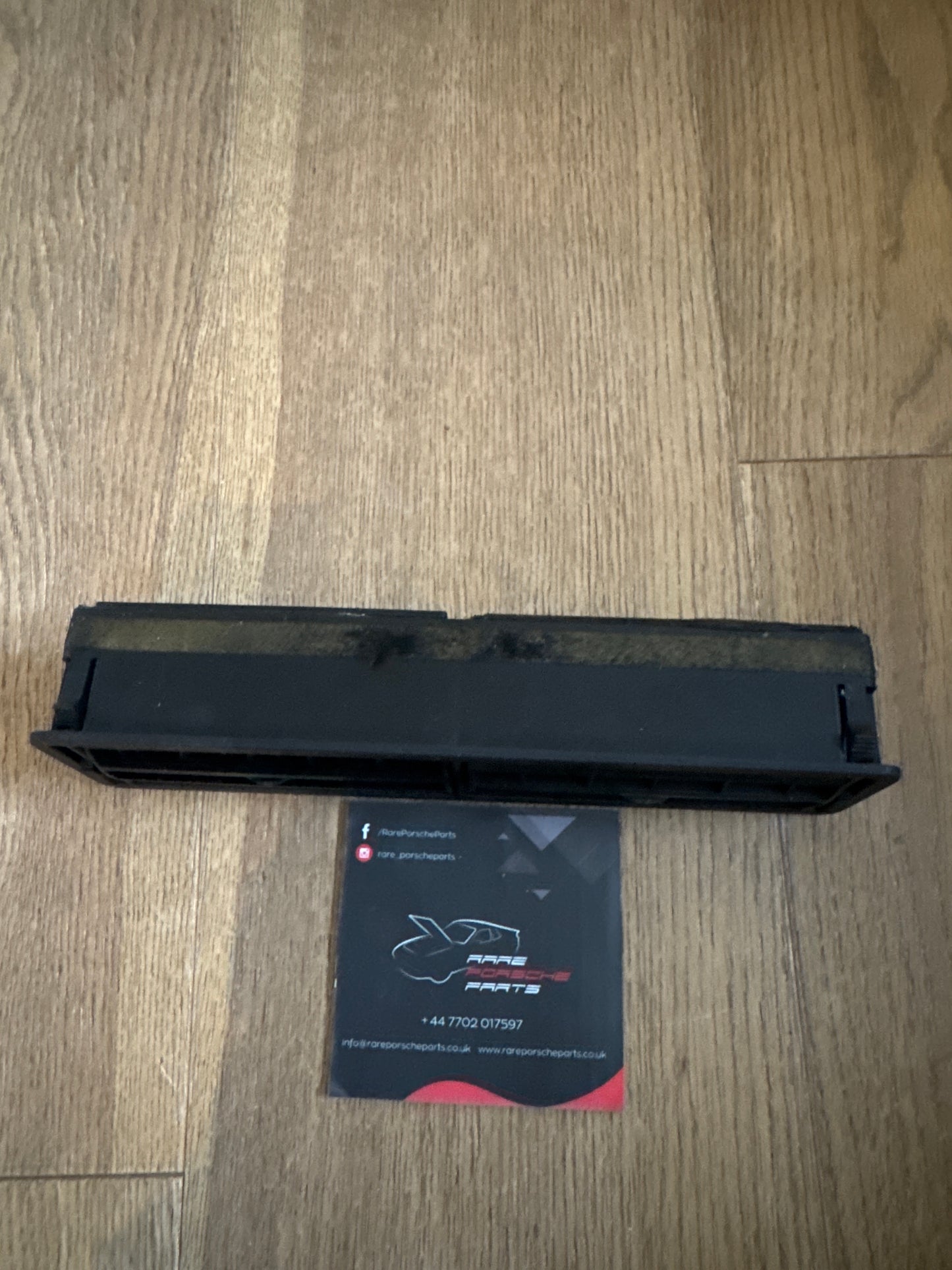 Porsche 924 944 Black Interior dash air vent. 477819173 New NOS