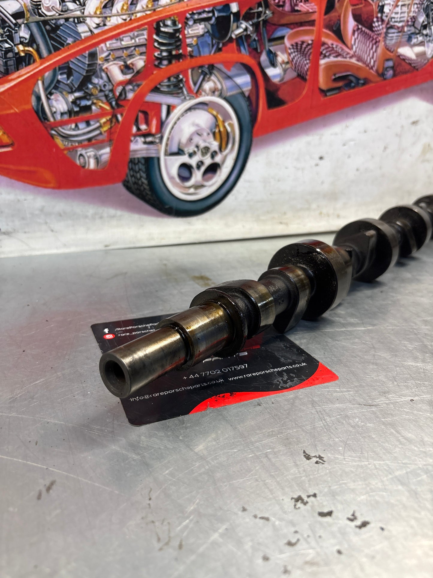Porsche 928 cam shaft, used 9281051870R