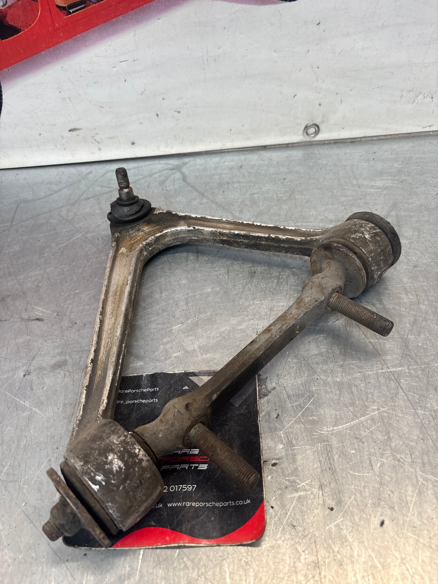 Porsche 928 S4 Upper front left wishbone, used 92834103131
