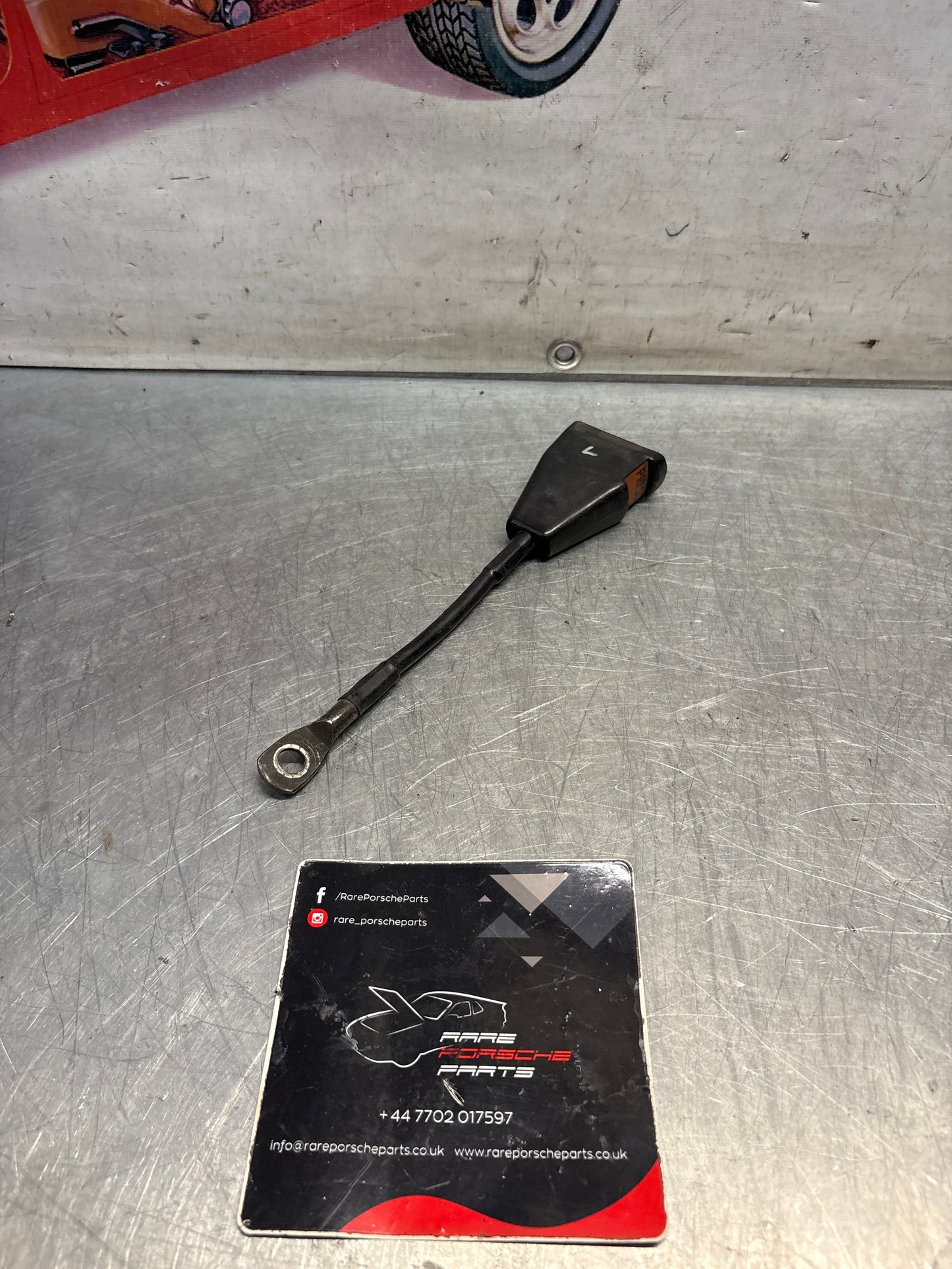 Used Porsche 924 early left seat belt anchor clasp retainer, buckle. 477857755D (used)